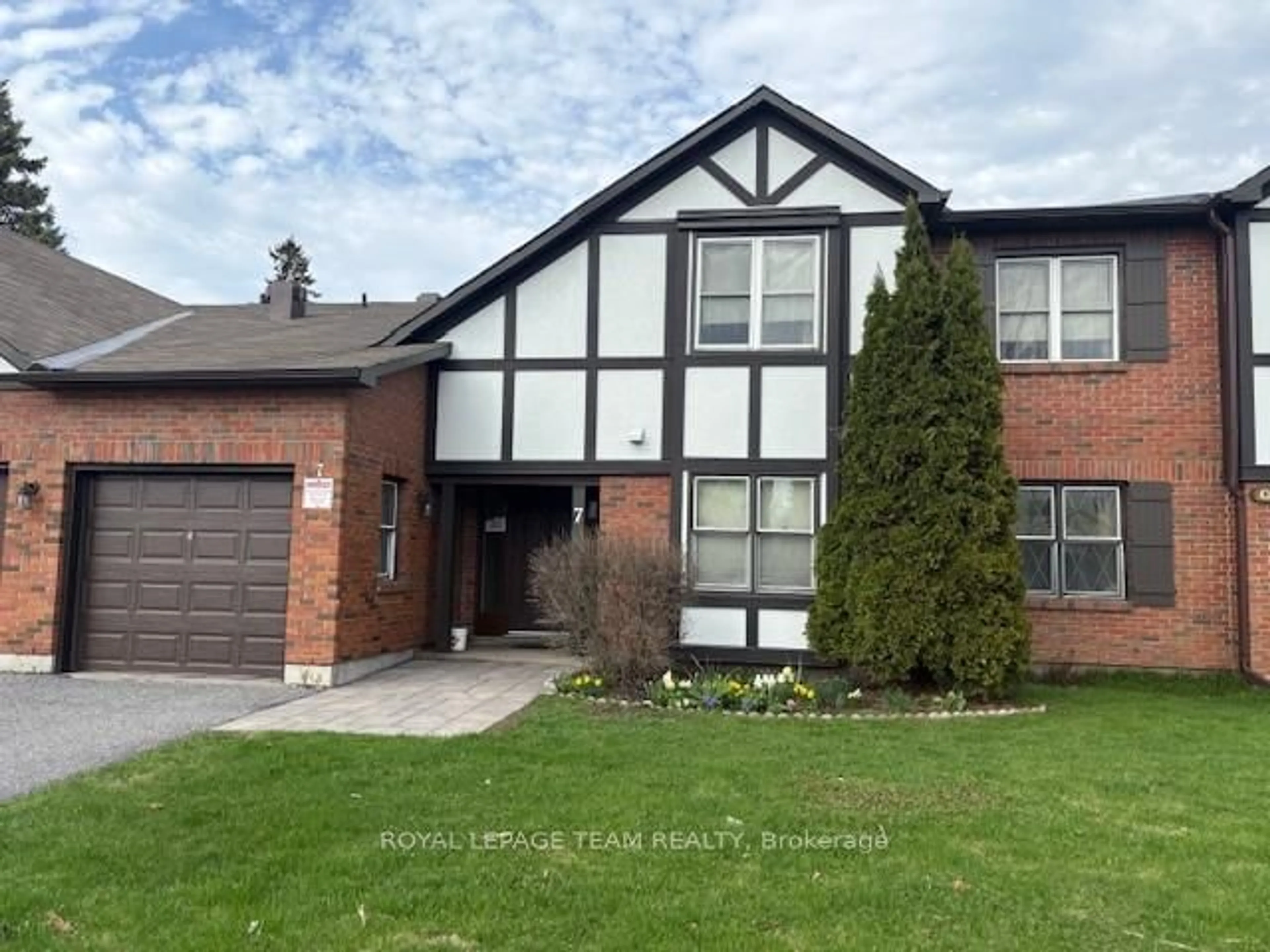 Home with brick exterior material, street for 7 Harness Lane #B, Ottawa Ontario K2M 1E1