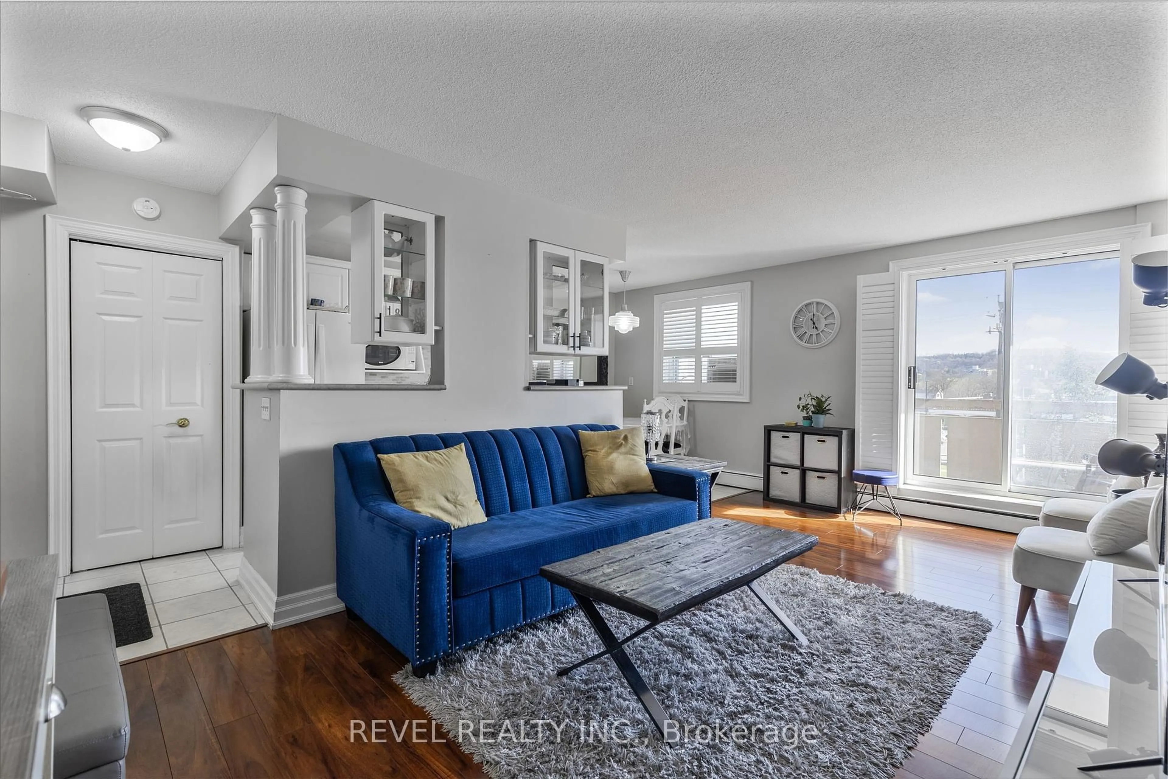 Living room with furniture, unknown for 851 Queenston Rd #406, Hamilton Ontario L8G 1B4