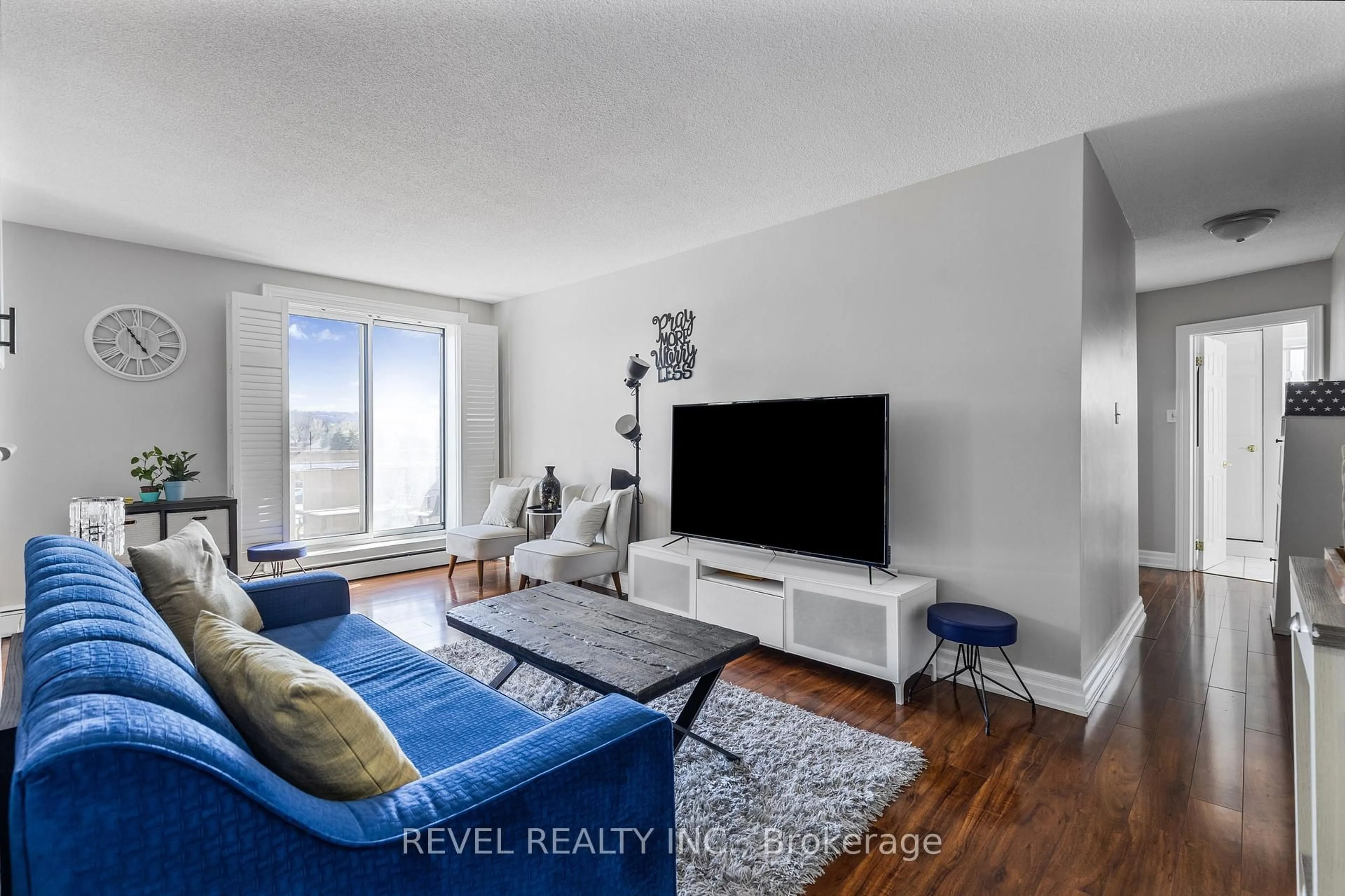 Living room with furniture, unknown for 851 Queenston Rd #406, Hamilton Ontario L8G 1B4