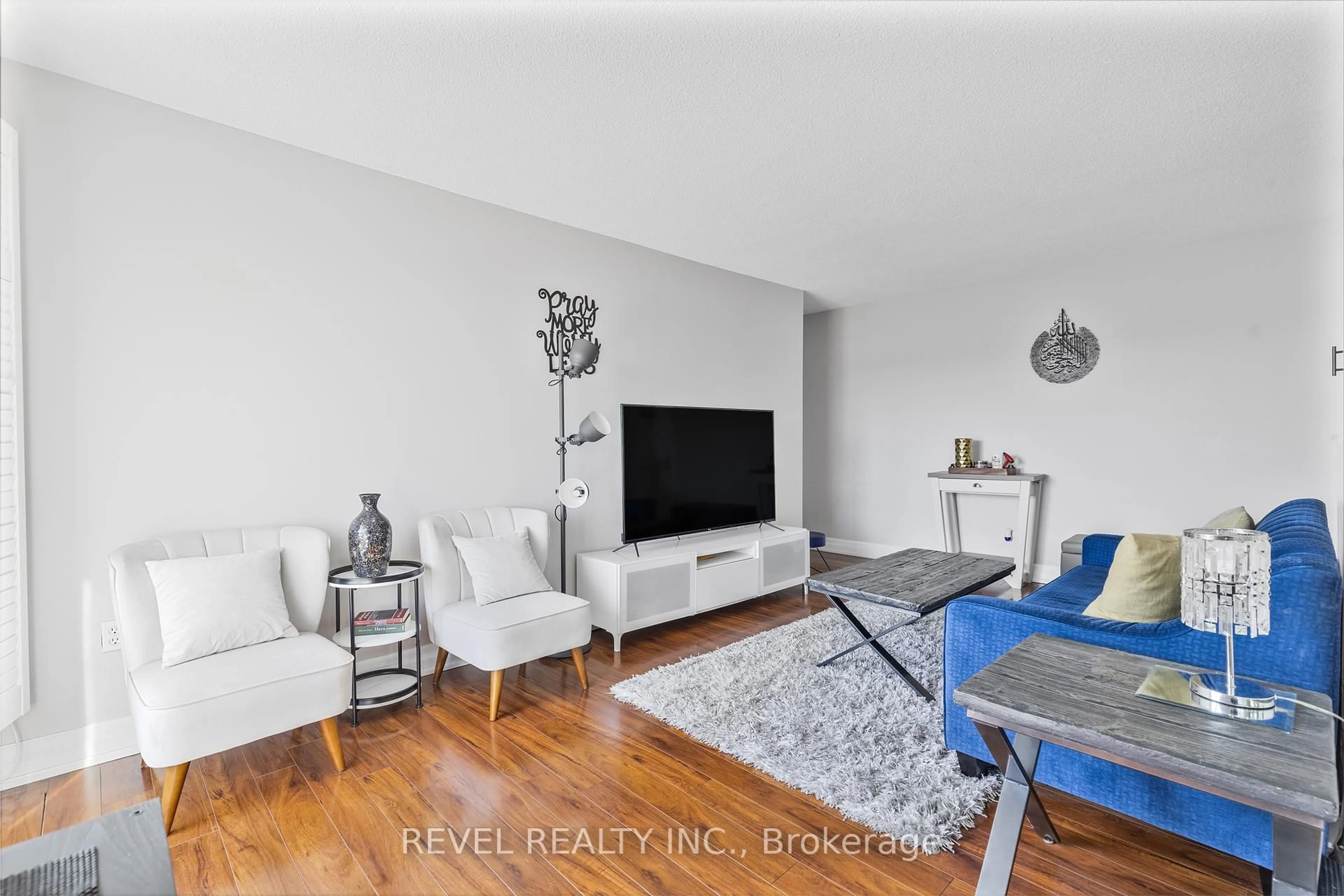 Living room with furniture, unknown for 851 Queenston Rd #406, Hamilton Ontario L8G 1B4