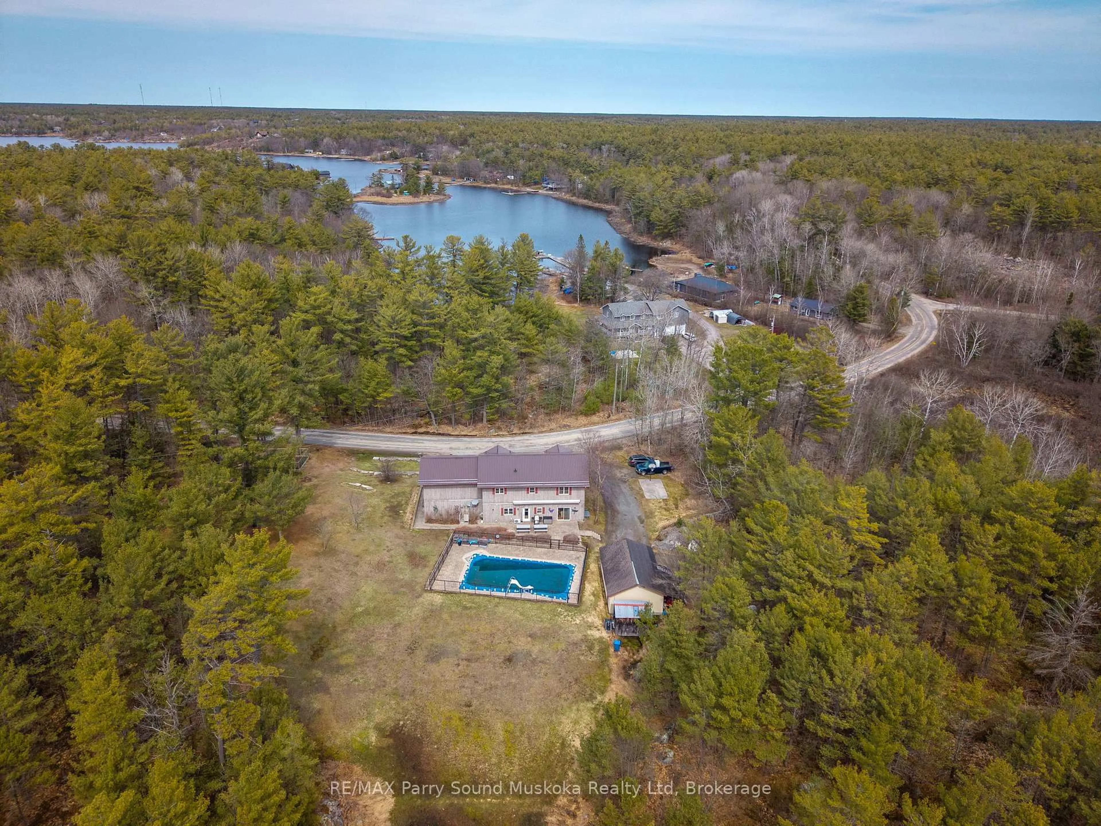 A pic from outside/outdoor area/front of a property/back of a property/a pic from drone, water/lake/river/ocean view for 217 South Shore Rd, The Archipelago Ontario P0G 1K0