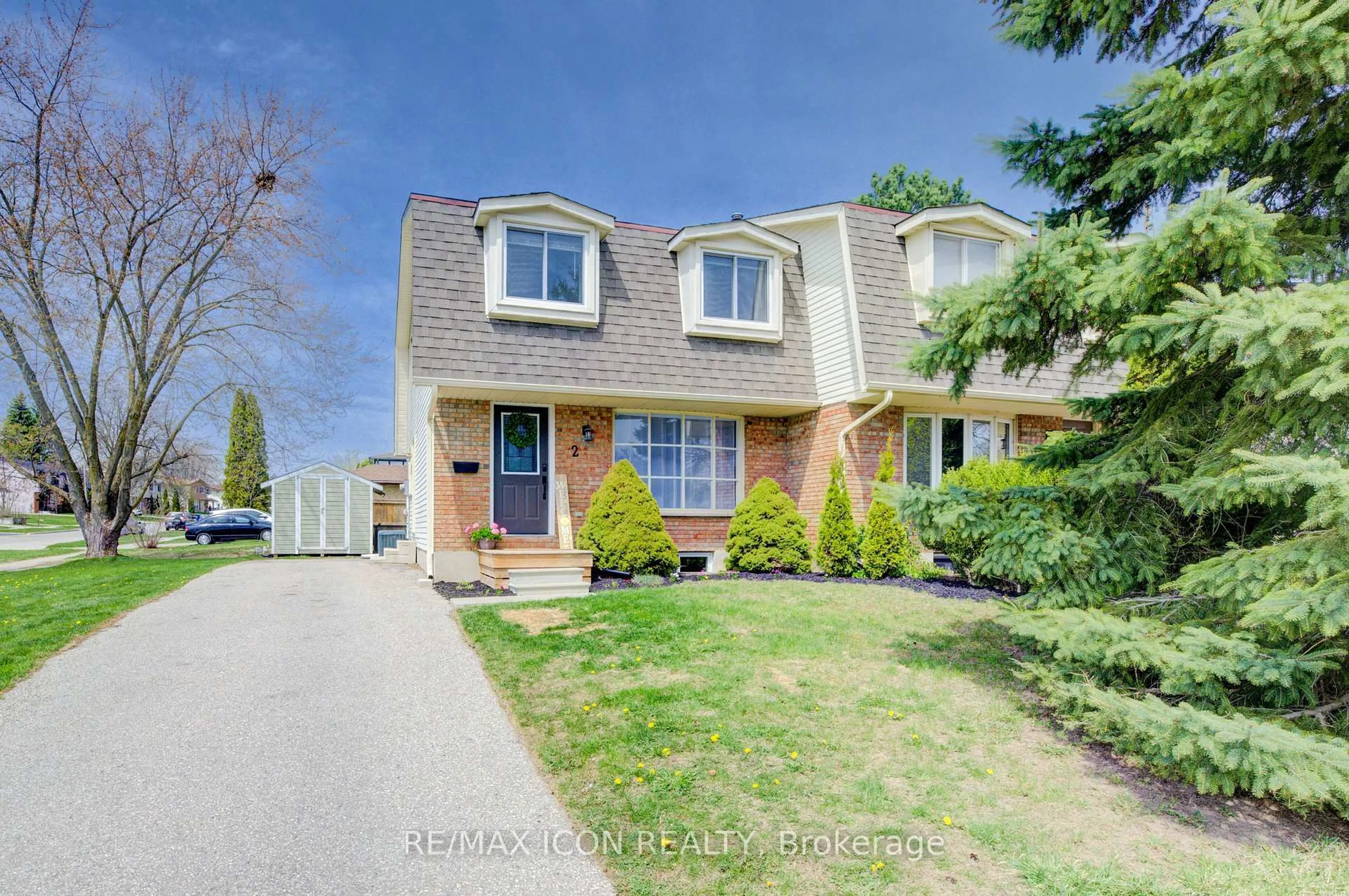 Home with brick exterior material, street for 2 Briarlea Rd, Guelph Ontario N1G 3H5