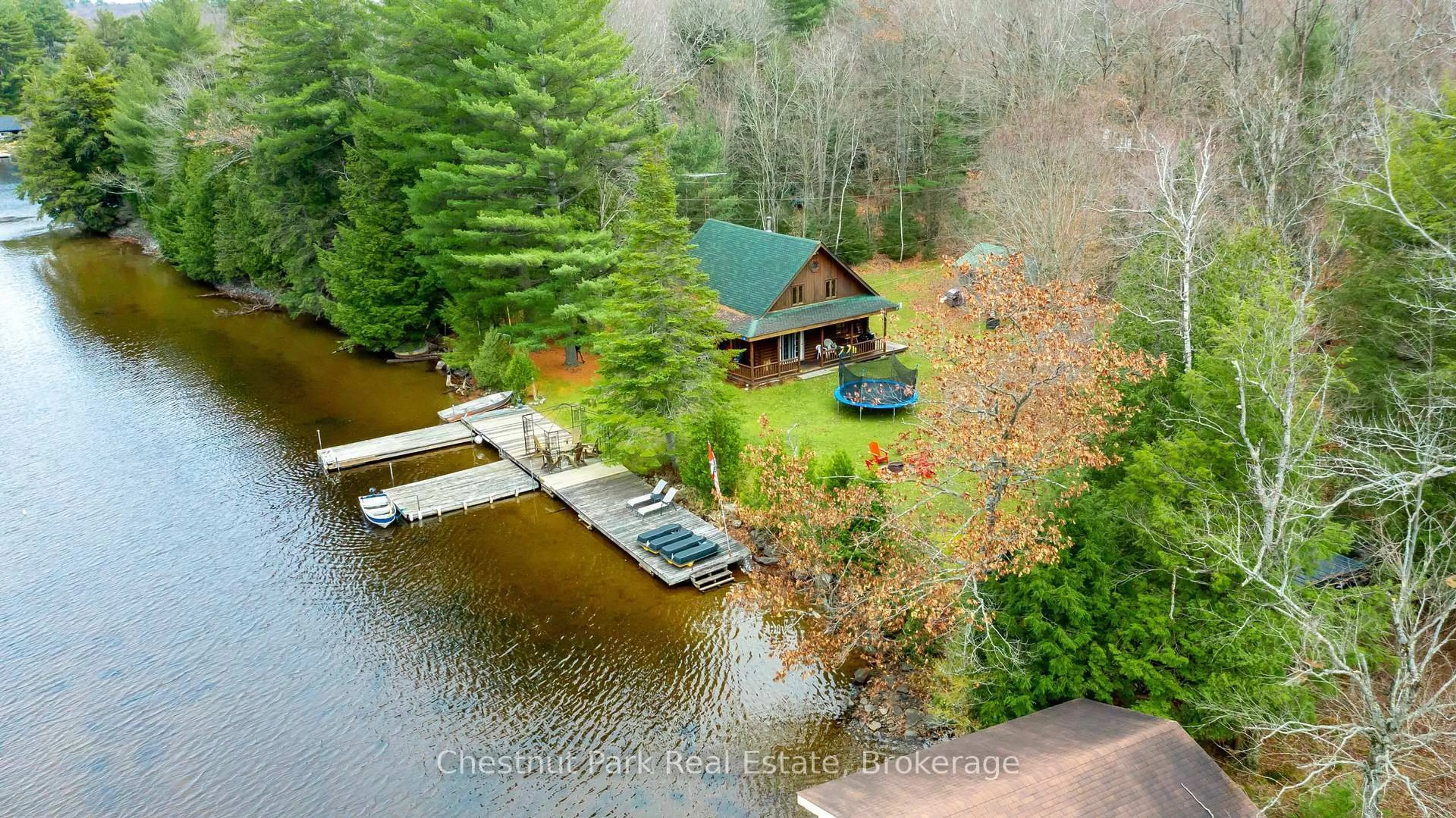 A pic from outside/outdoor area/front of a property/back of a property/a pic from drone, water/lake/river/ocean view for 30 MCVITTIE ISLAND N/A, Bracebridge Ontario P1L 1W4