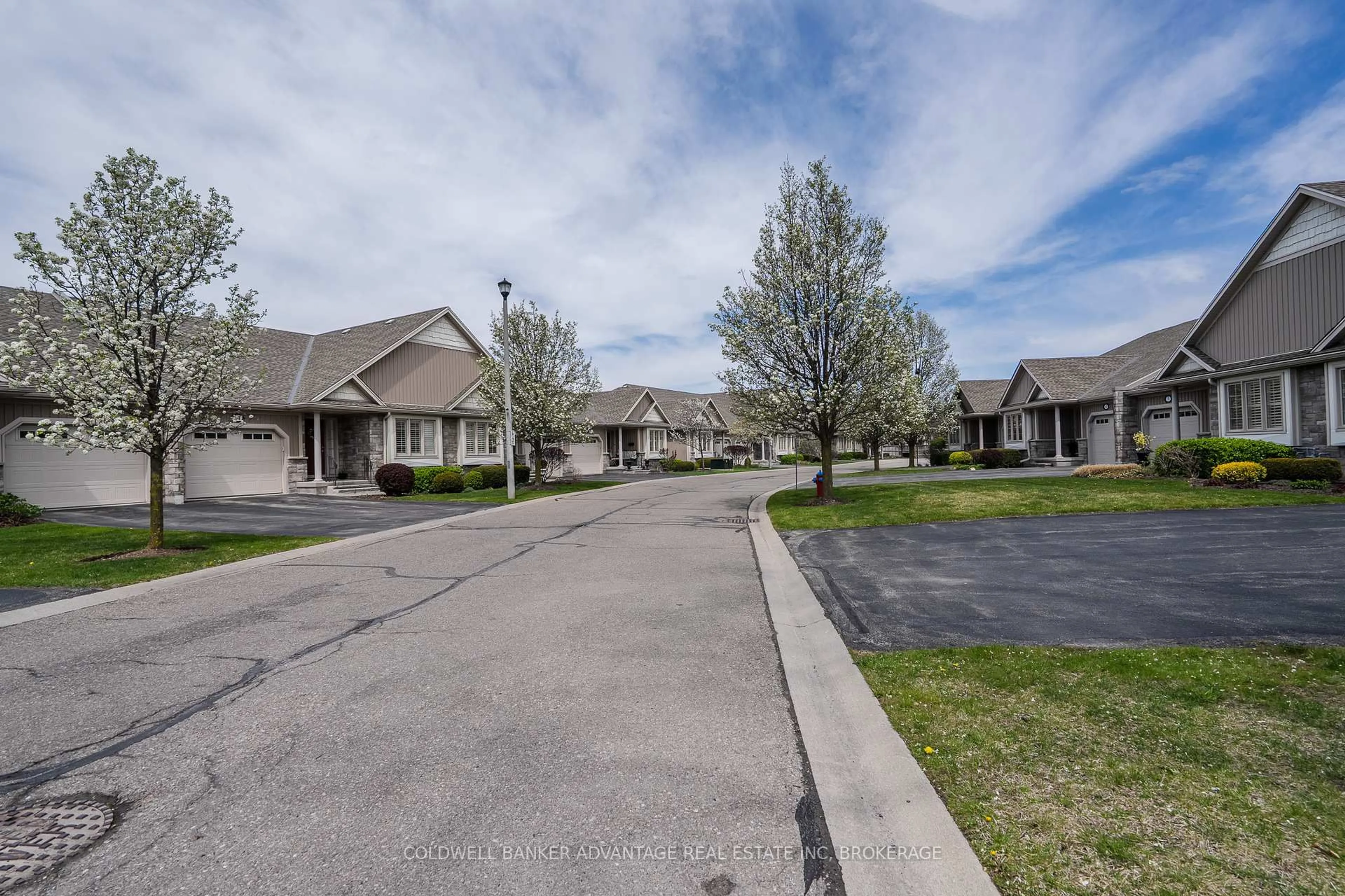 A pic from outside/outdoor area/front of a property/back of a property/a pic from drone, street for 603 Welland Ave #15, St. Catharines Ontario L2M 0A6
