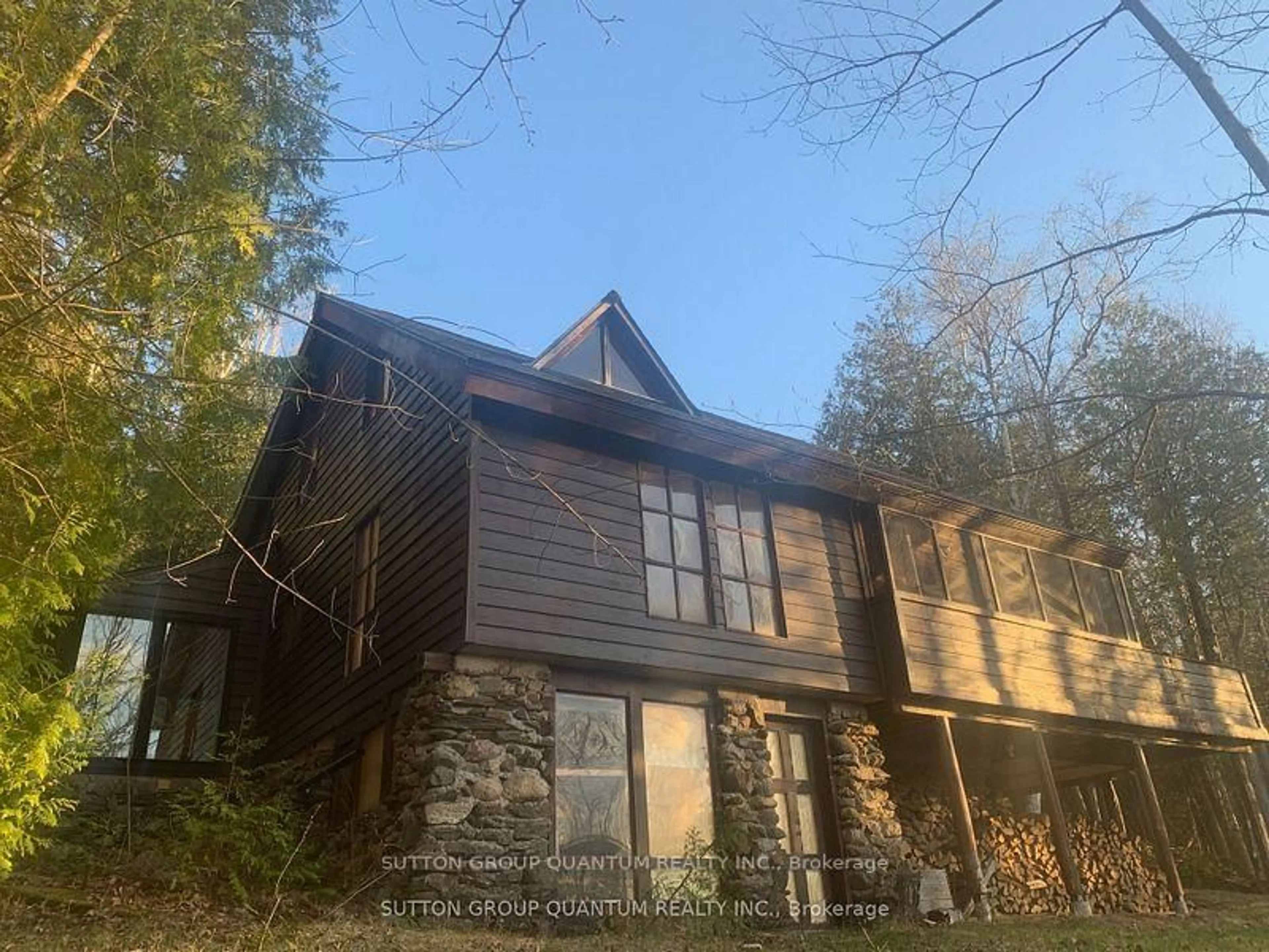 A pic from outside/outdoor area/front of a property/back of a property/a pic from drone, unknown for 2724 River Rd, Ompah Ontario K0H 2J0