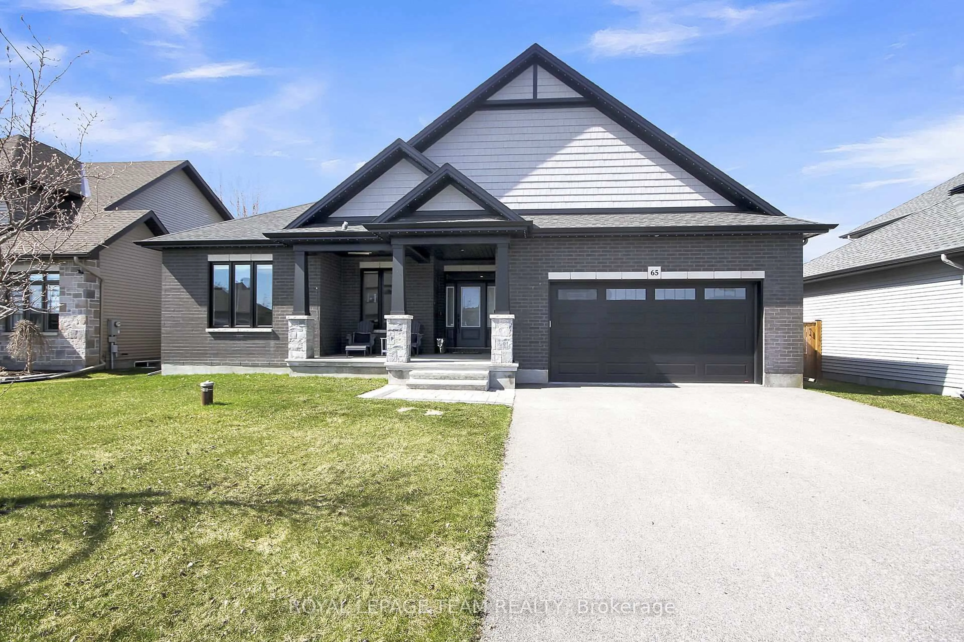 Home with brick exterior material, street for 65 Nixon Farm Dr, Richmond Ontario K0A 2Z0