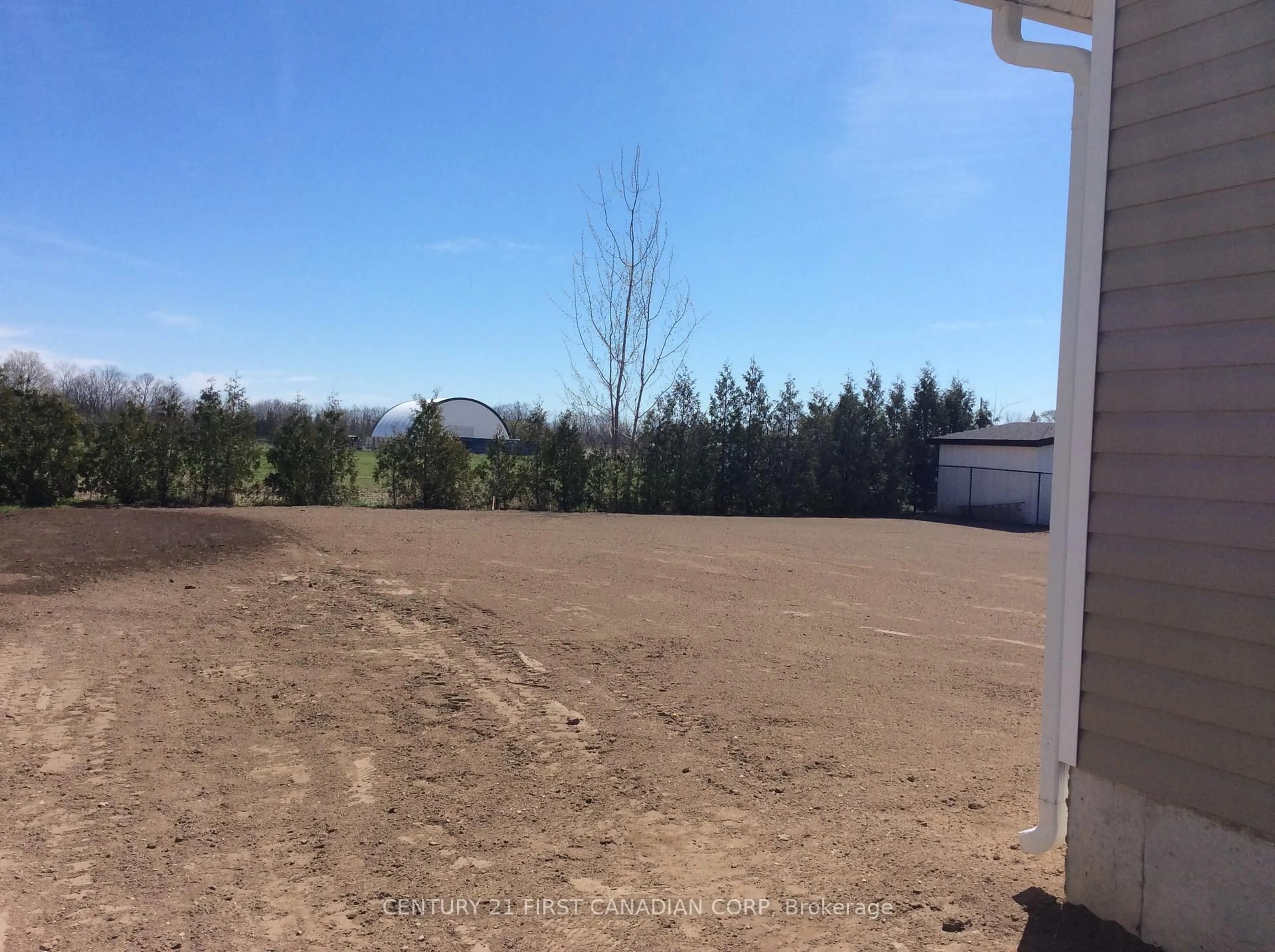A pic from outside/outdoor area/front of a property/back of a property/a pic from drone, unknown for 184 Elizabeth St, Lambton Shores Ontario N0M 2N0