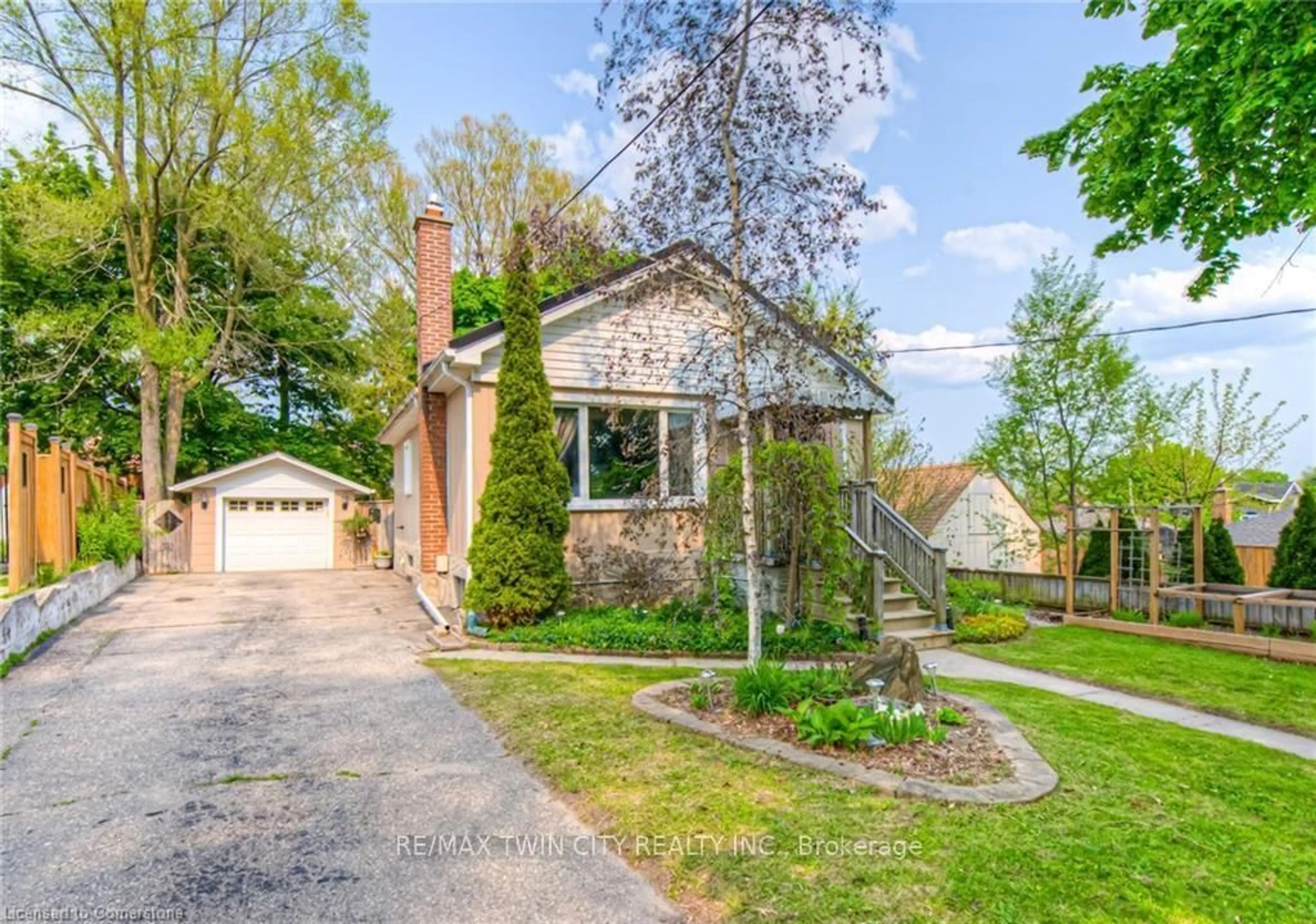 Home with brick exterior material, street for 12 Barclay Ave, Kitchener Ontario N2M 4B1
