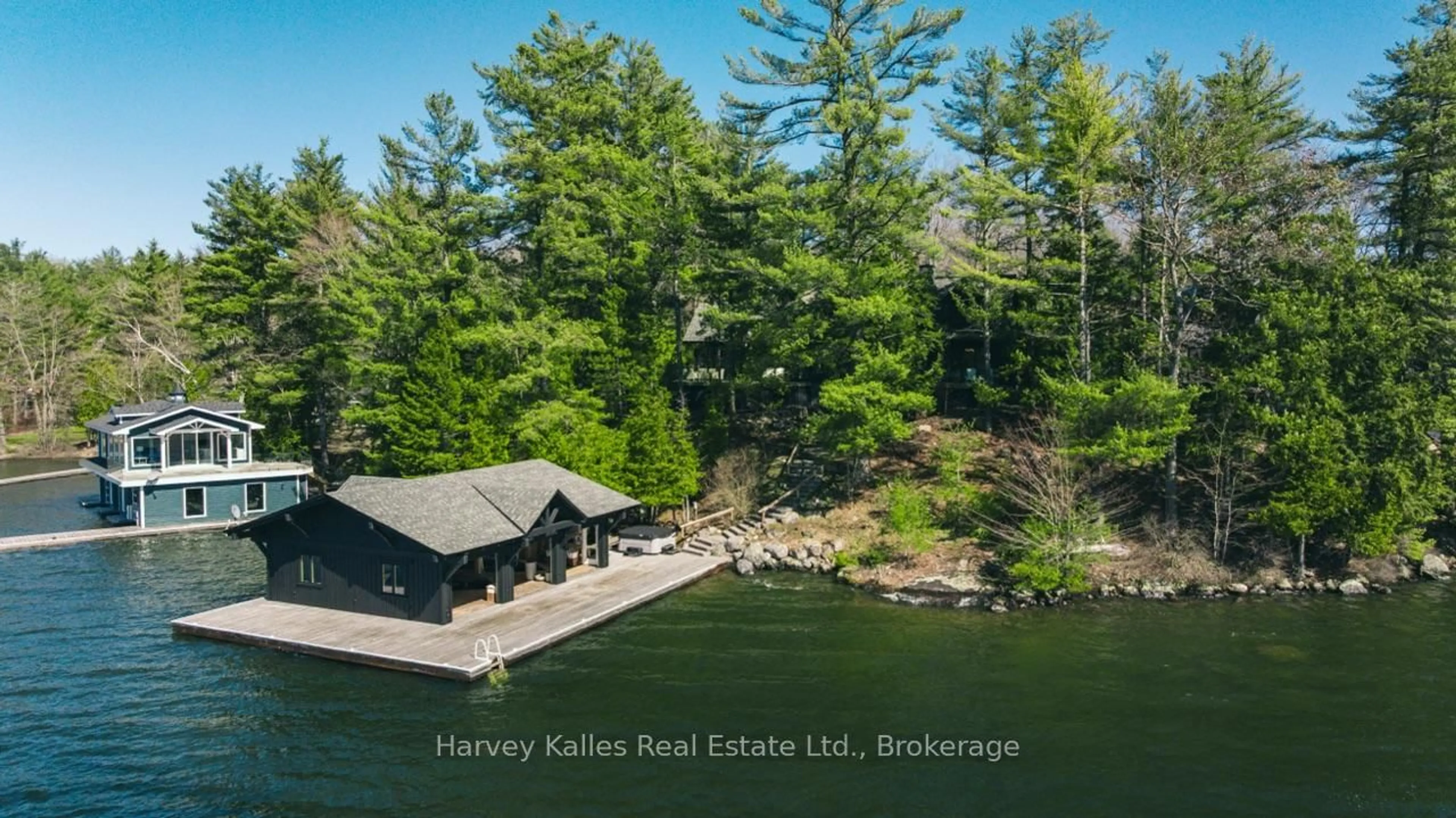 A pic from outside/outdoor area/front of a property/back of a property/a pic from drone, water/lake/river/ocean view for 1059 Big Joe Rd #10, Muskoka Lakes Ontario P0B 1J0