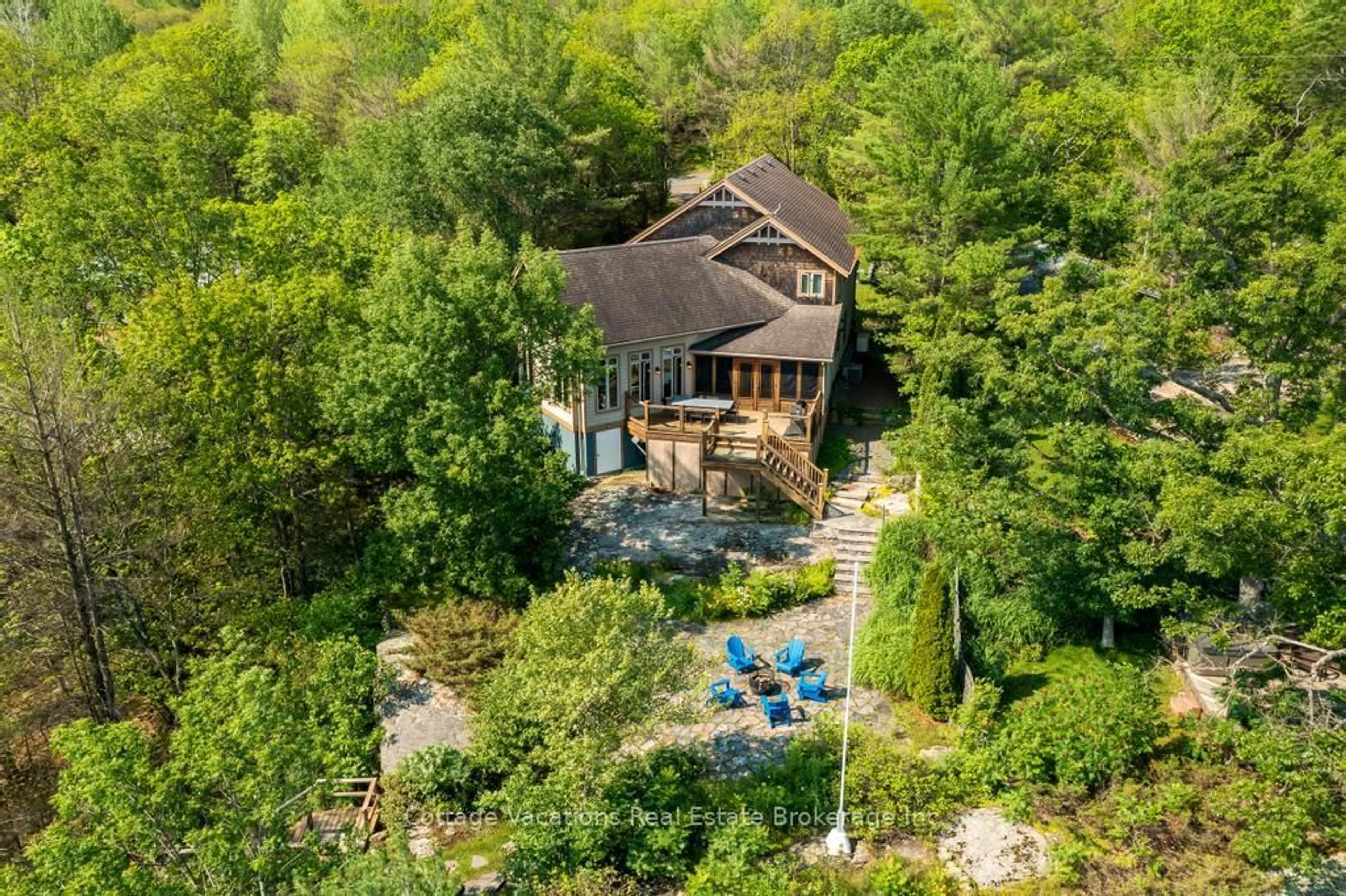 A pic from outside/outdoor area/front of a property/back of a property/a pic from drone, water/lake/river/ocean view for 1016 Lawland Heights Rd, Gravenhurst Ontario P1P 1R2