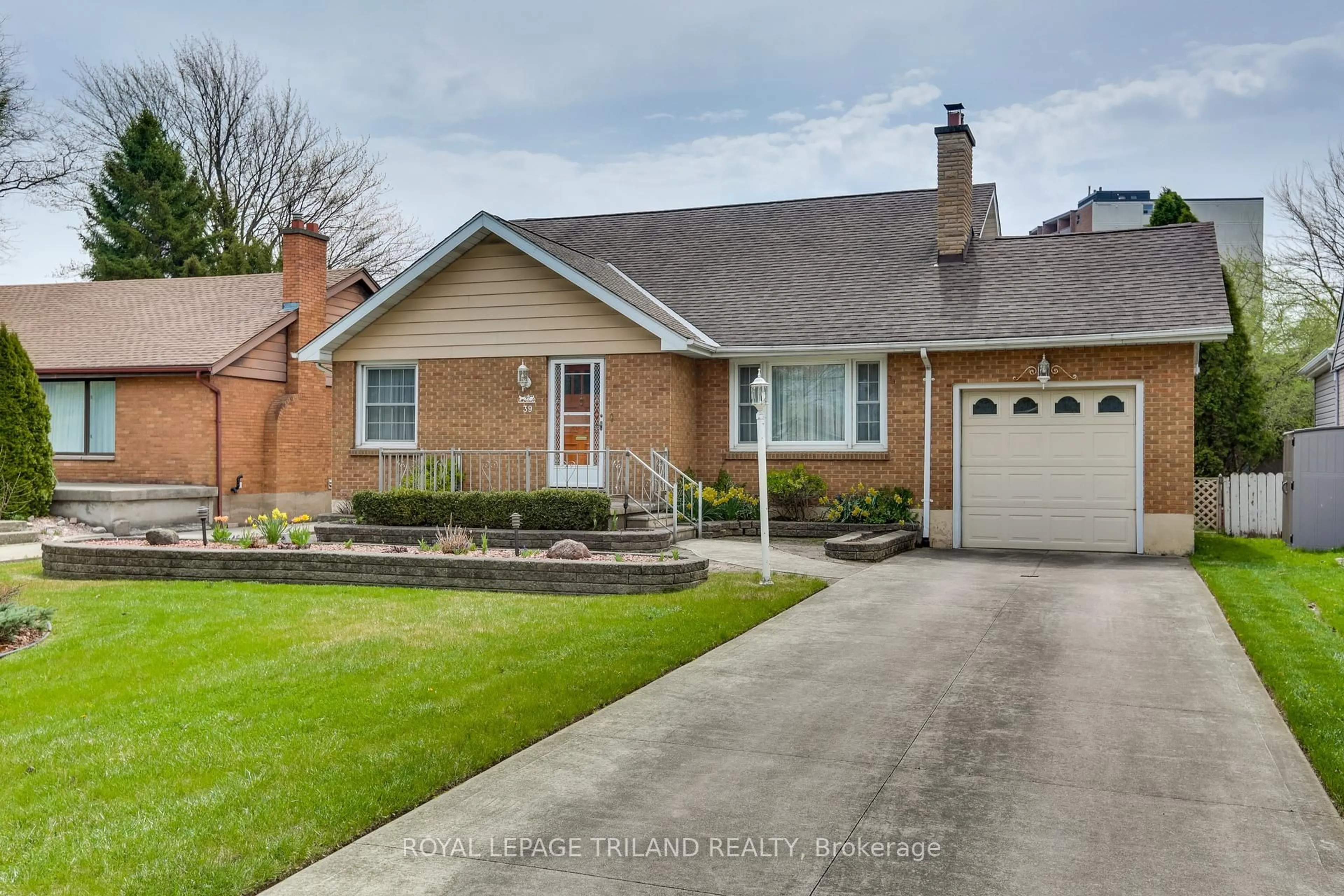 Home with brick exterior material, street for 39 Base Line Rd, London South Ontario N6C 2N6