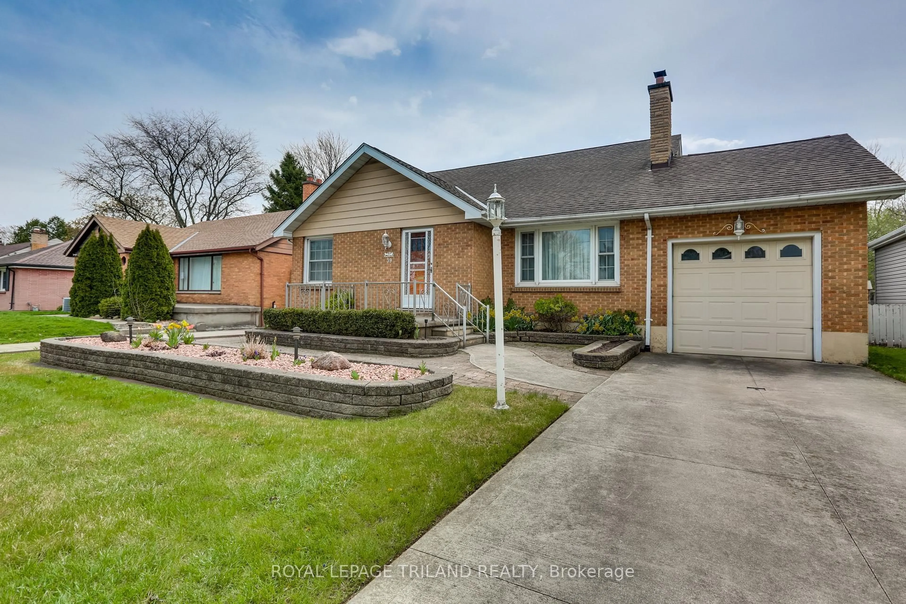 Home with brick exterior material, street for 39 Base Line Rd, London South Ontario N6C 2N6