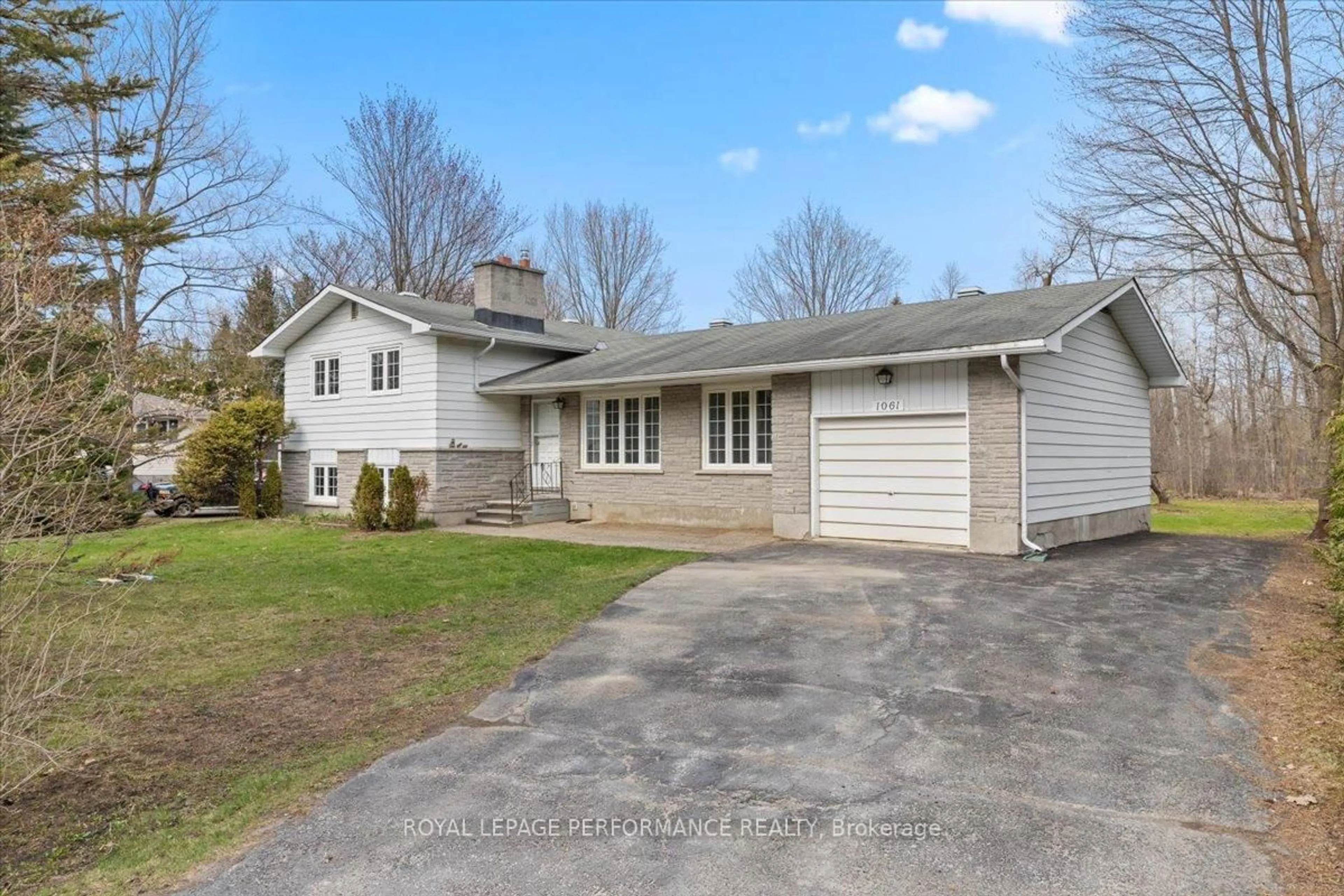 A pic from outside/outdoor area/front of a property/back of a property/a pic from drone, street for 1061 Manotick Station Rd, Ottawa Ontario K4M 1B2