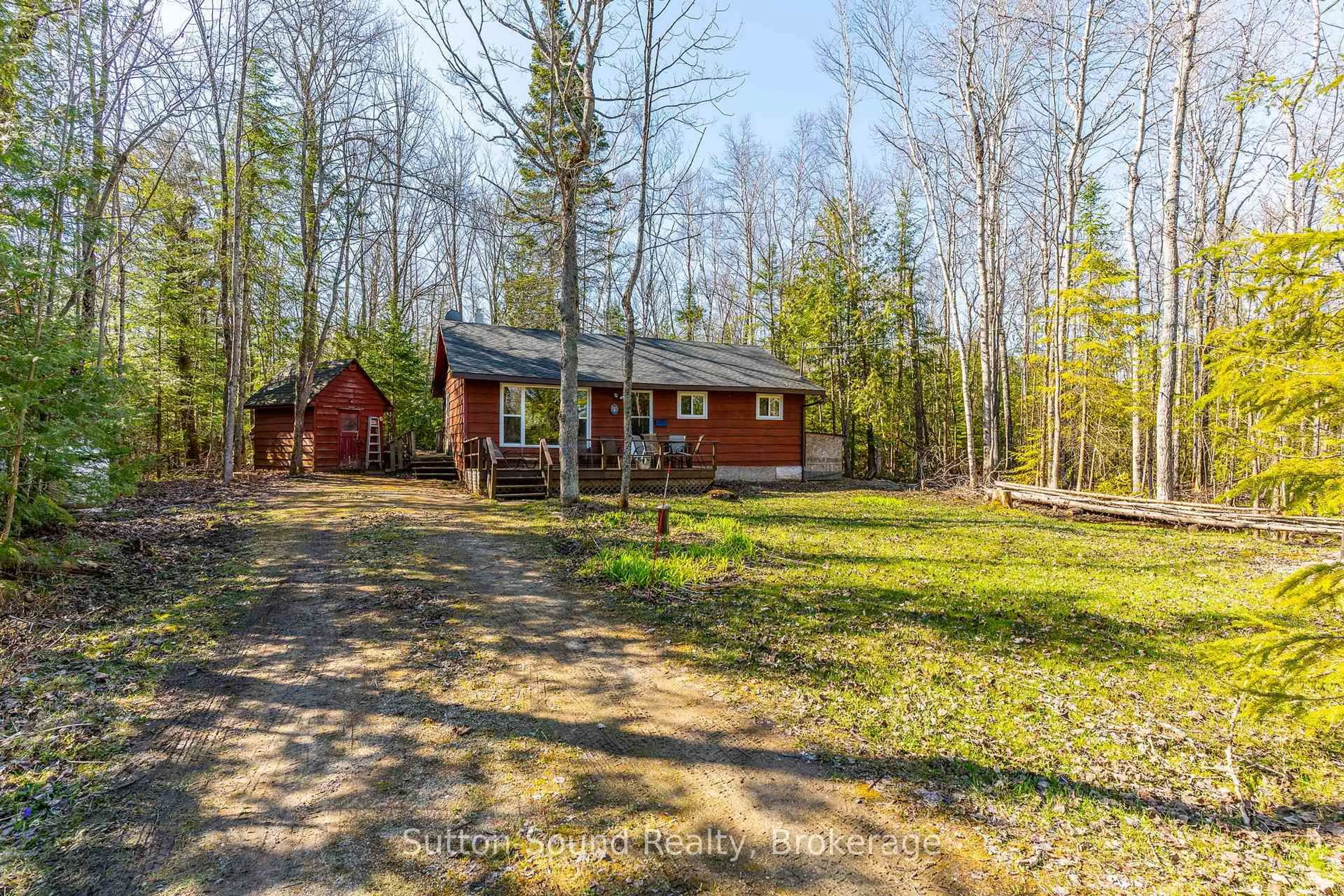 A pic from outside/outdoor area/front of a property/back of a property/a pic from drone, forest/trees view for 44 Roth Dr, South Bruce Peninsula Ontario N0H 2T0