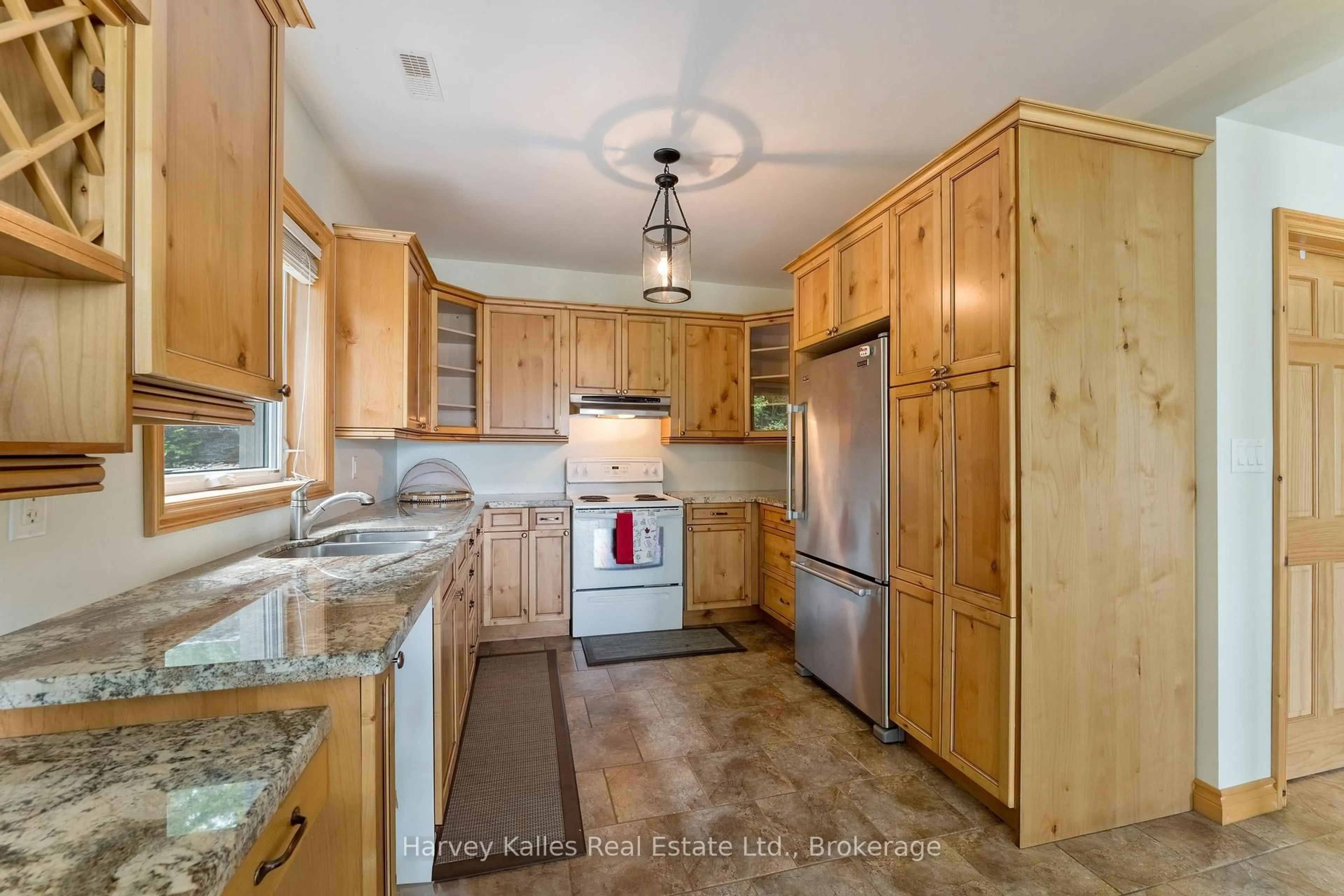 Standard kitchen, ceramic/tile floor for 1161 SANDWOOD Rd #9, Muskoka Lakes Ontario P0B 1M0