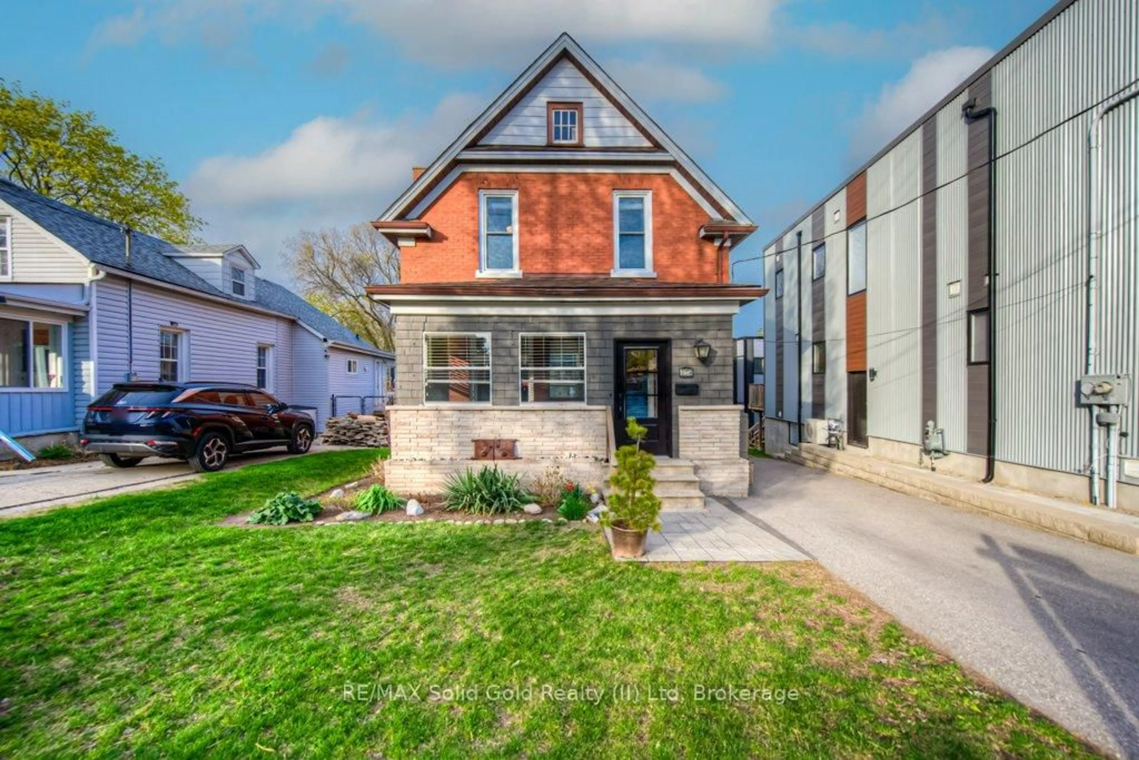Home with brick exterior material, street for 158 Waterloo St, Kitchener Ontario N2H 3V7