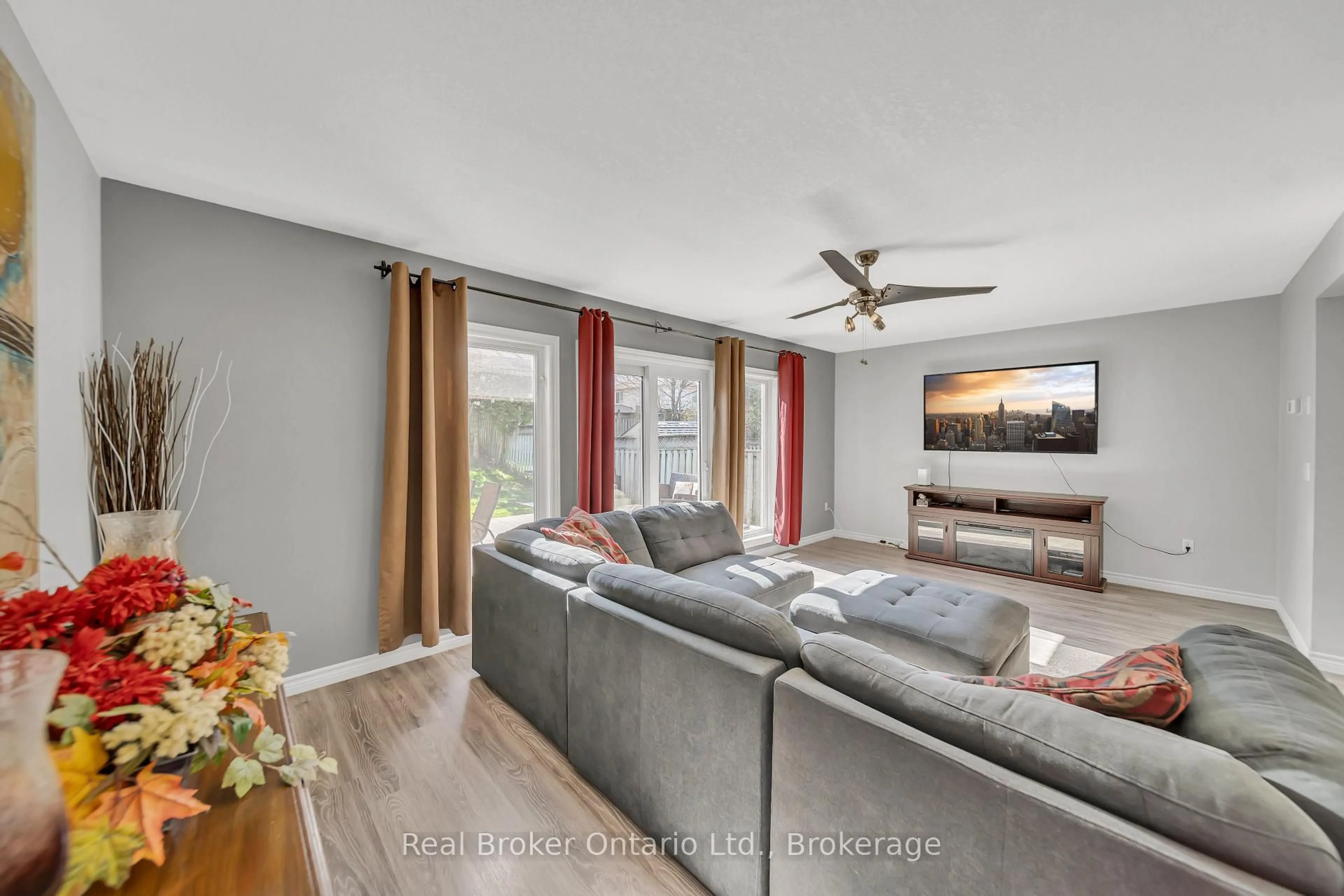 Living room with furniture, wood/laminate floor for 21 Mackay St, Guelph Ontario N1E 7H3