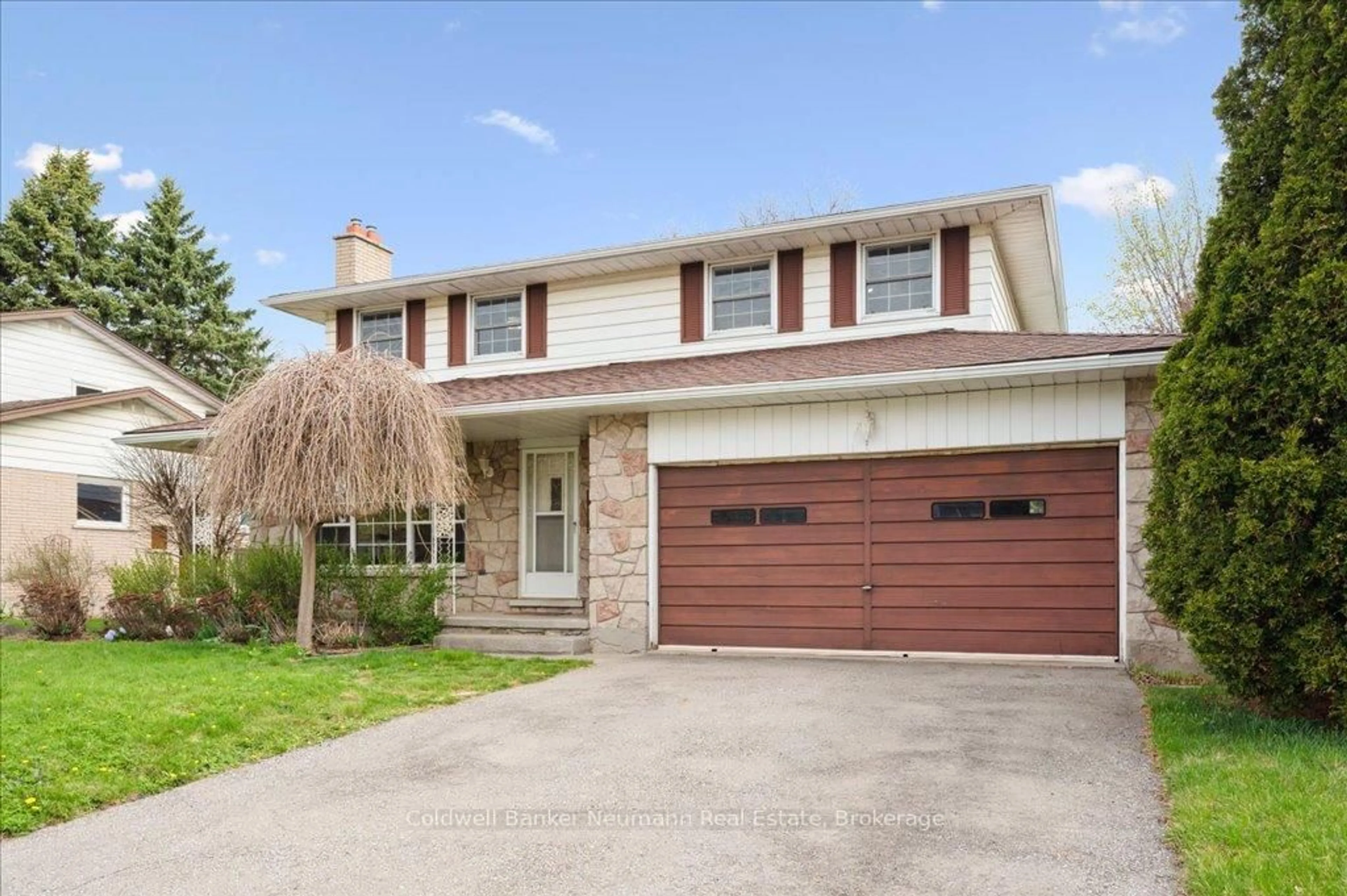 Home with brick exterior material, street for 61 Applewood Cres, Guelph Ontario N1H 6B3
