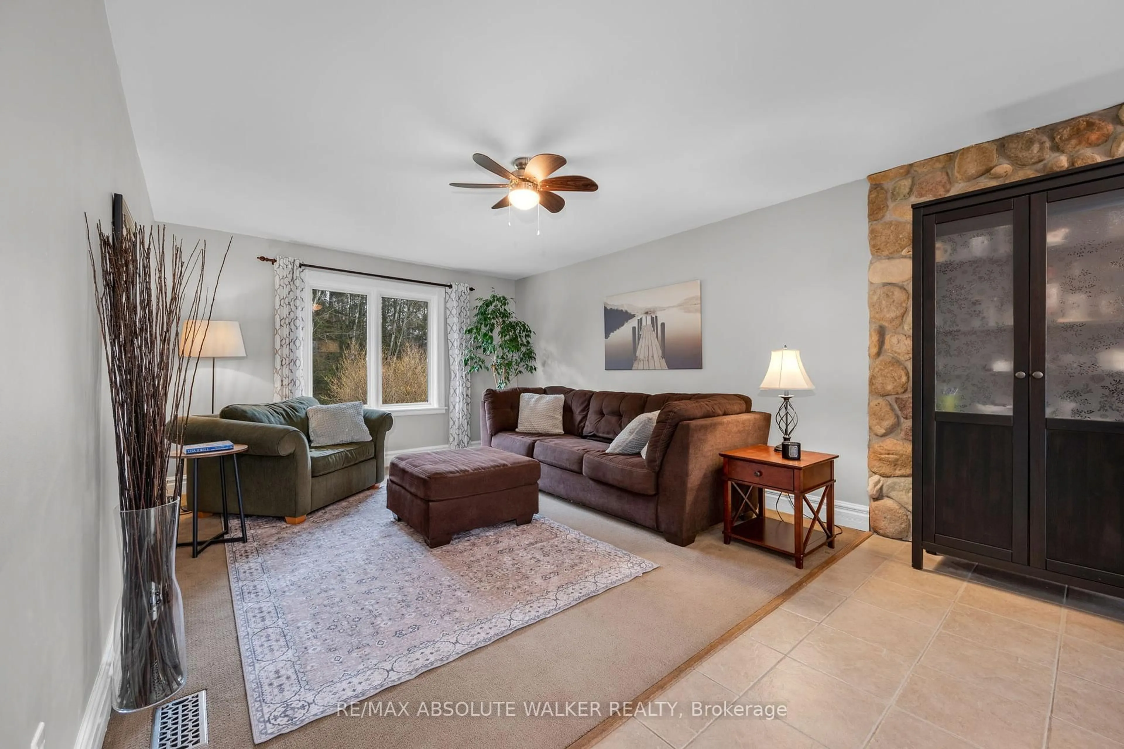 Living room with furniture, ceramic/tile floor for 3062 Joys Rd, Richmond Ontario K0A 2Z0
