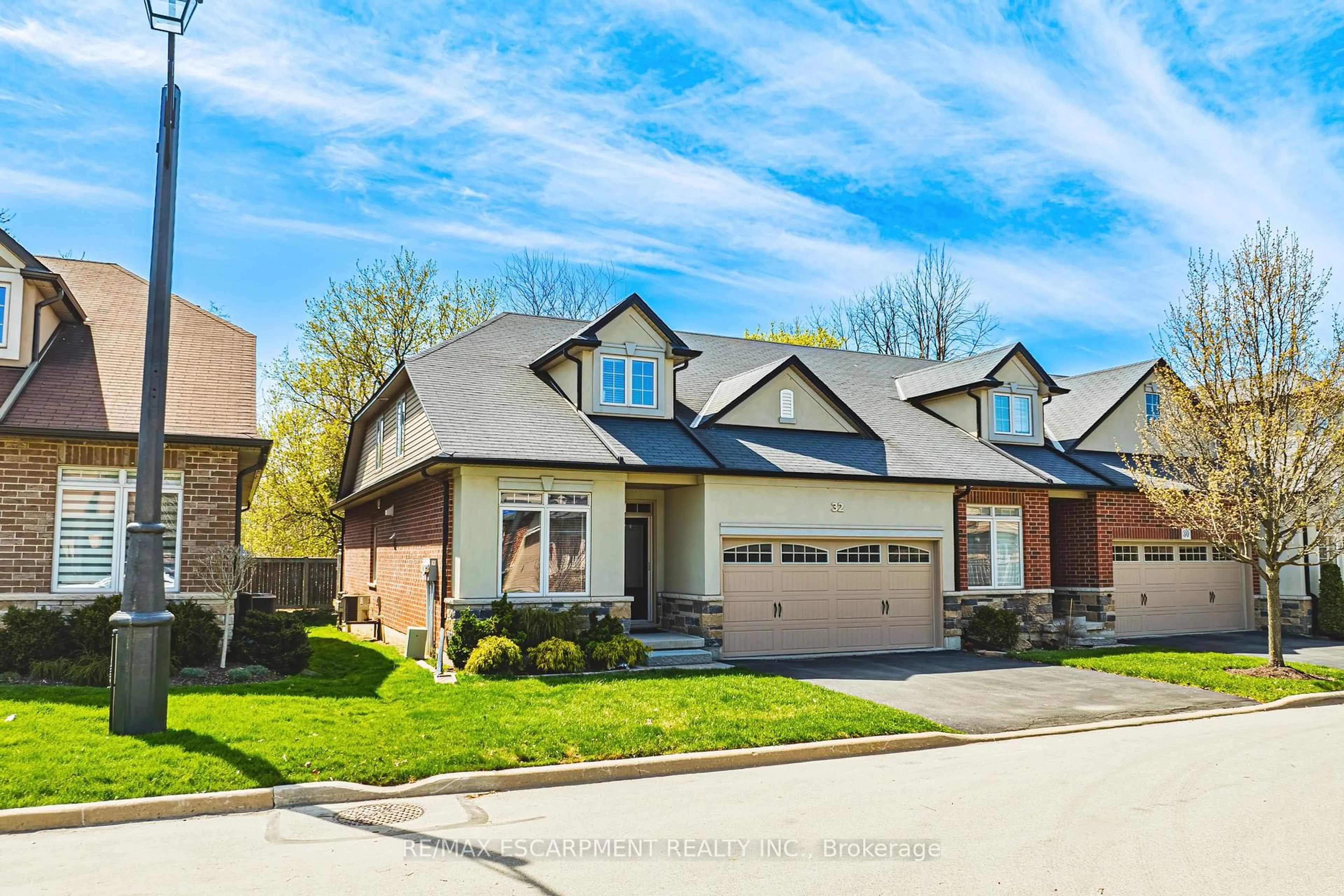 Home with brick exterior material, street for 32 Menton Dr, Hamilton Ontario L9G 3K9