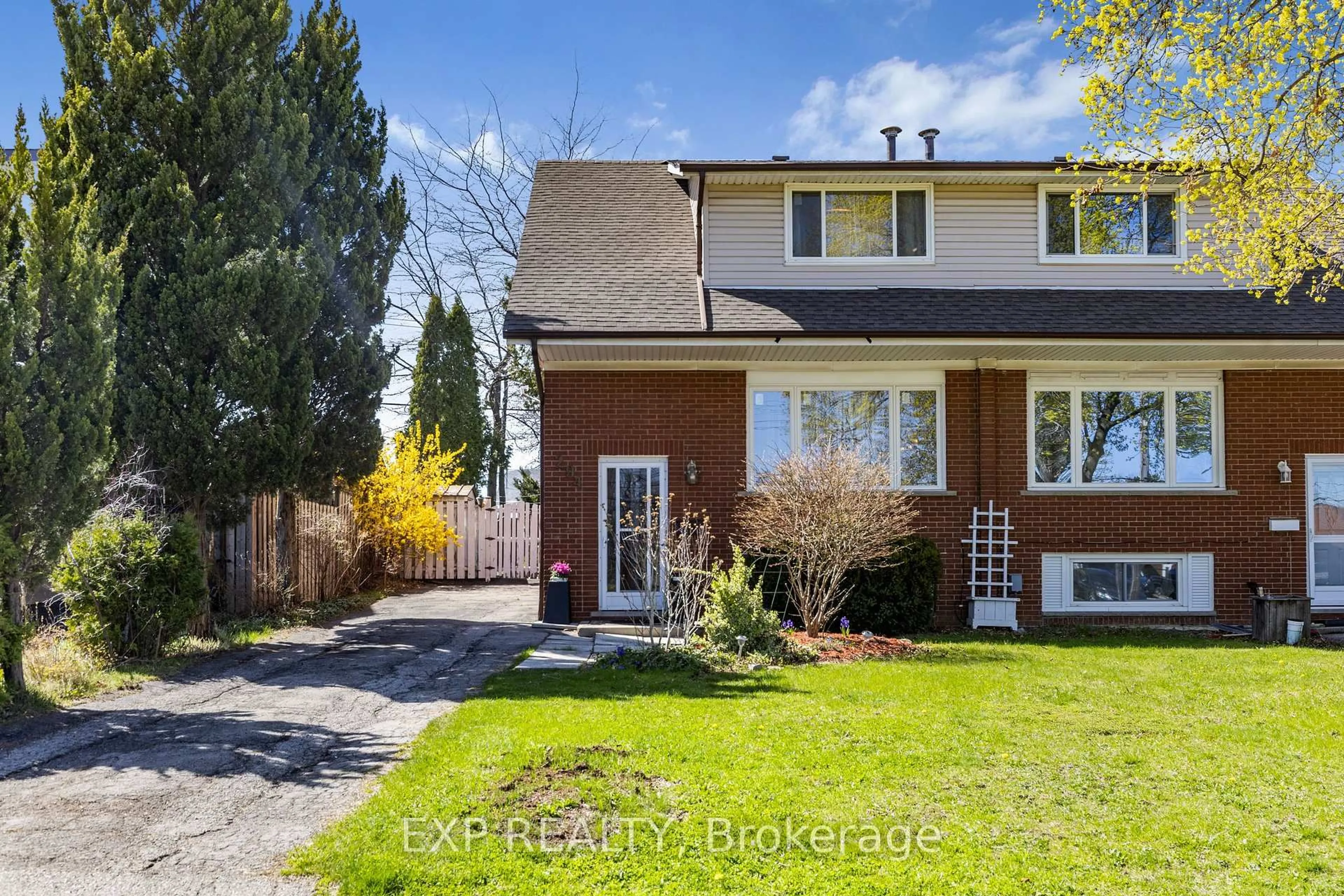Home with brick exterior material, street for 294 Quigley Rd, Hamilton Ontario L8K 5N1