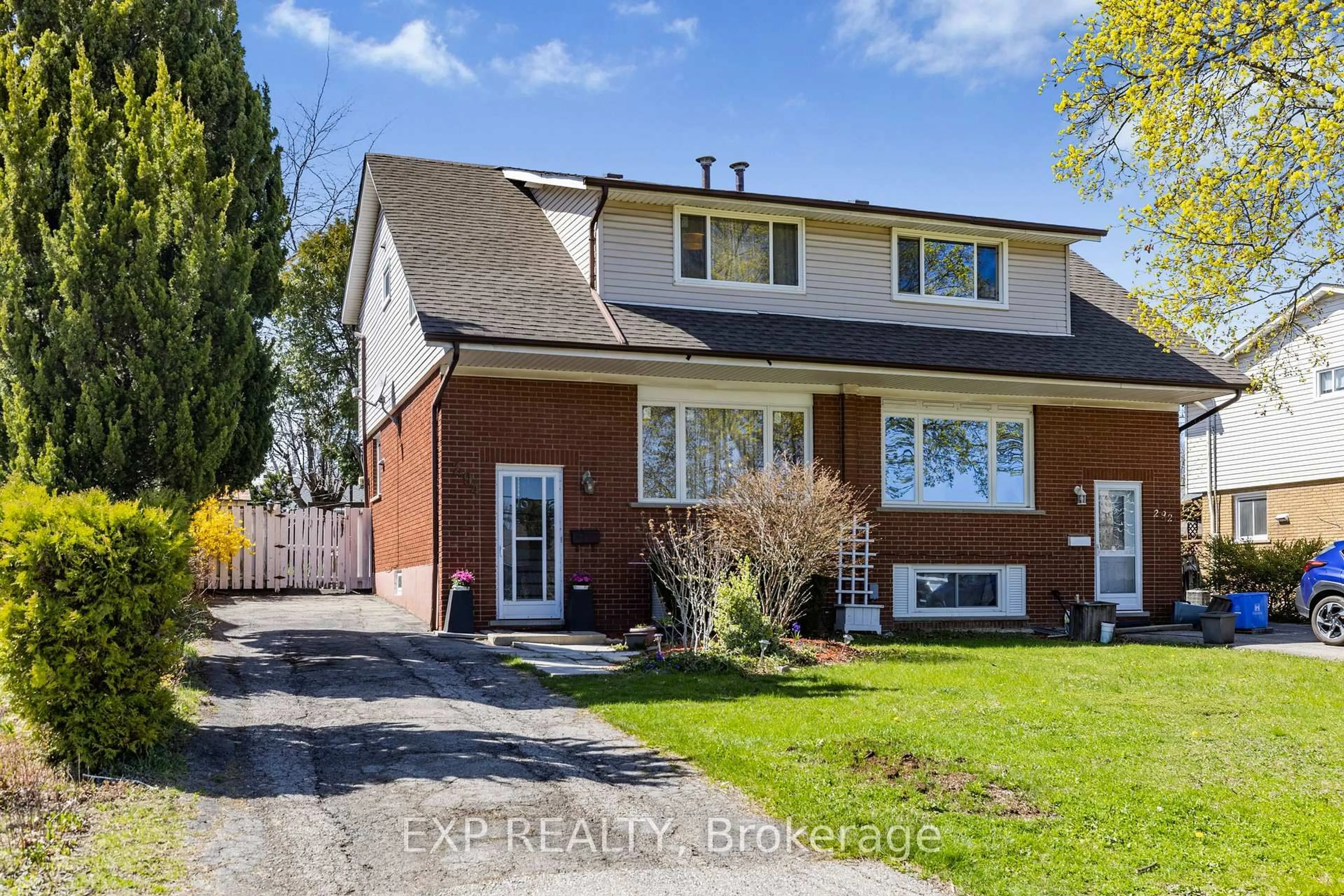Home with brick exterior material, street for 294 Quigley Rd, Hamilton Ontario L8K 5N1