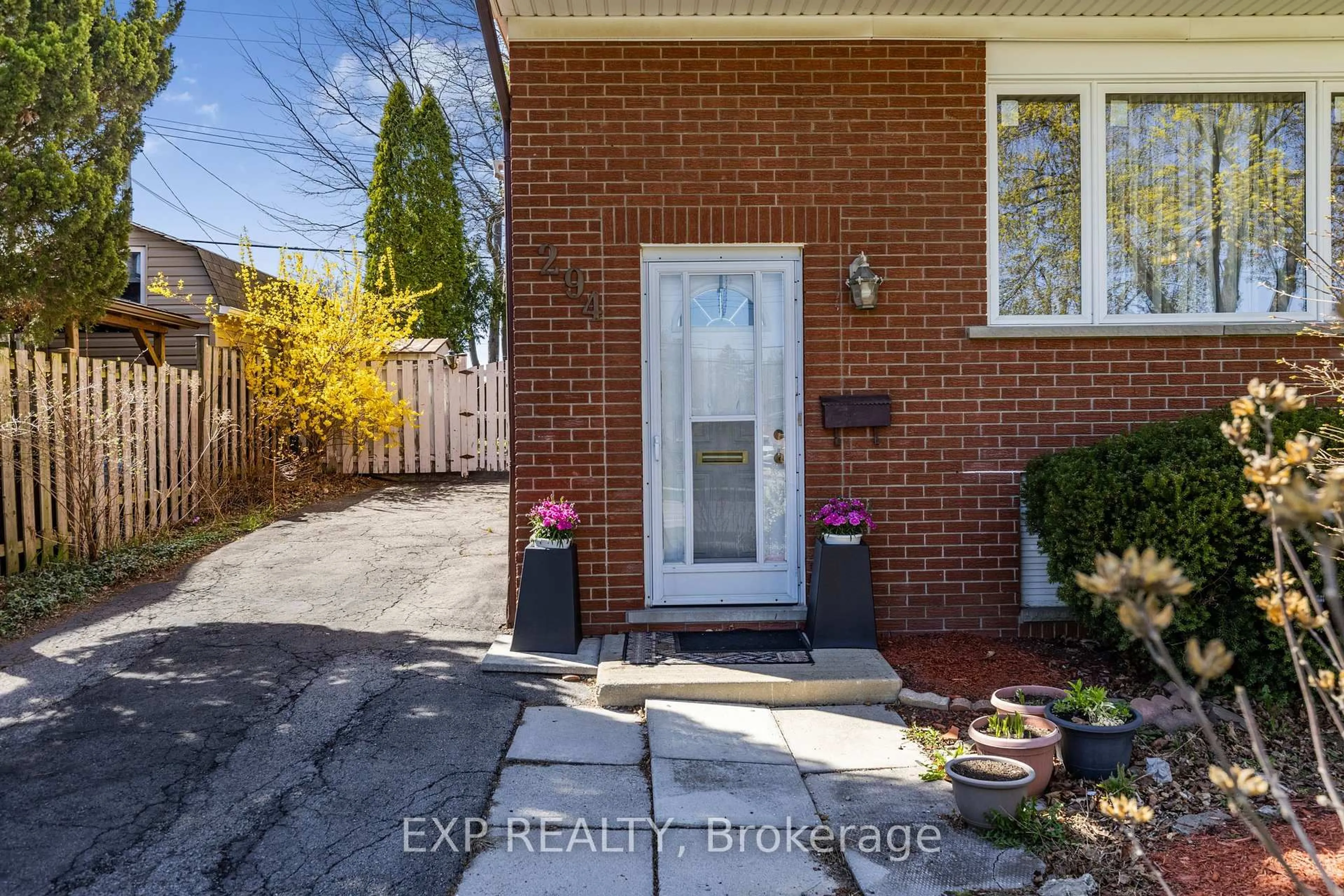 Home with brick exterior material, street for 294 Quigley Rd, Hamilton Ontario L8K 5N1