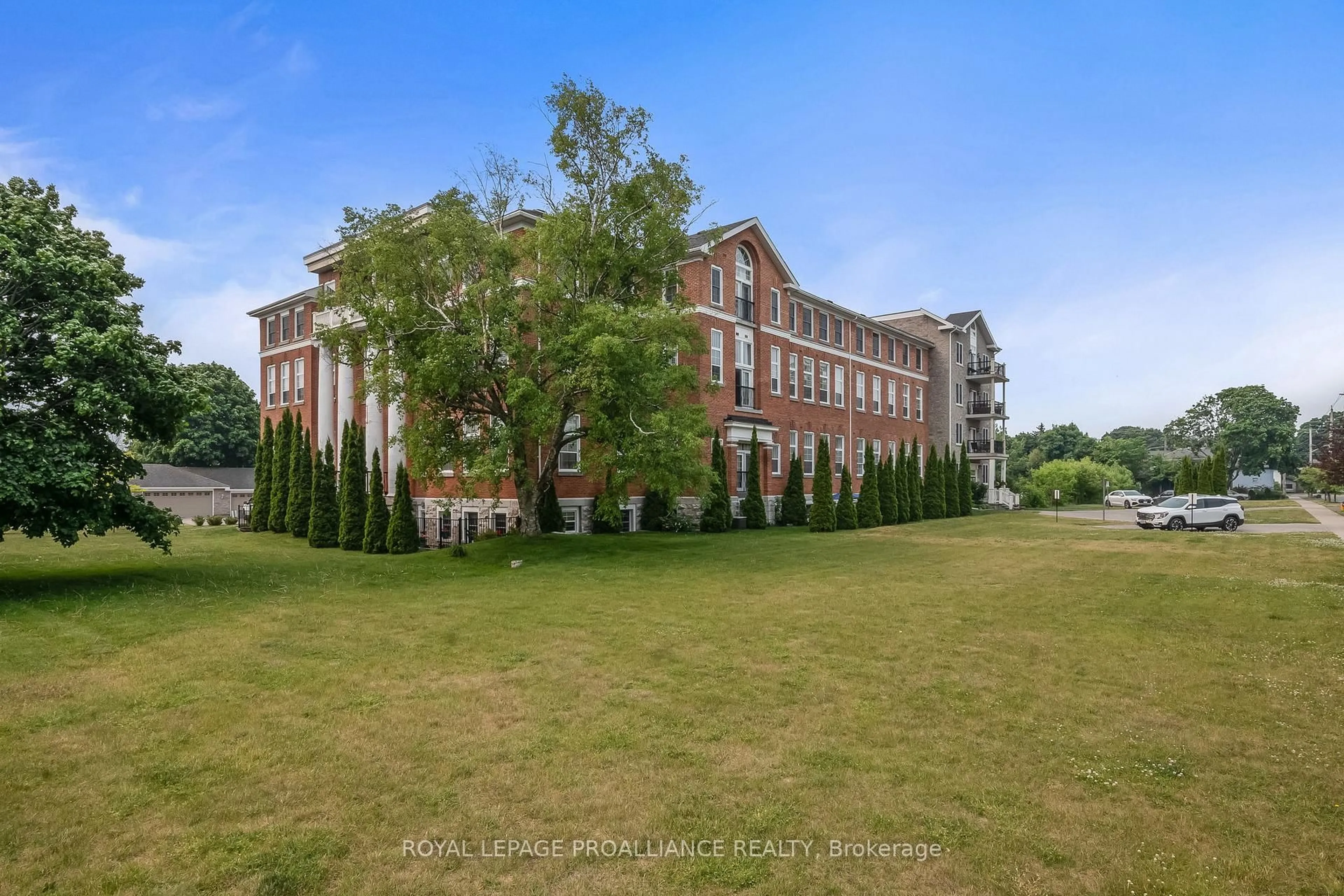 A pic from outside/outdoor area/front of a property/back of a property/a pic from drone, building for 323 George St #403, Cobourg Ontario K9A 3L9