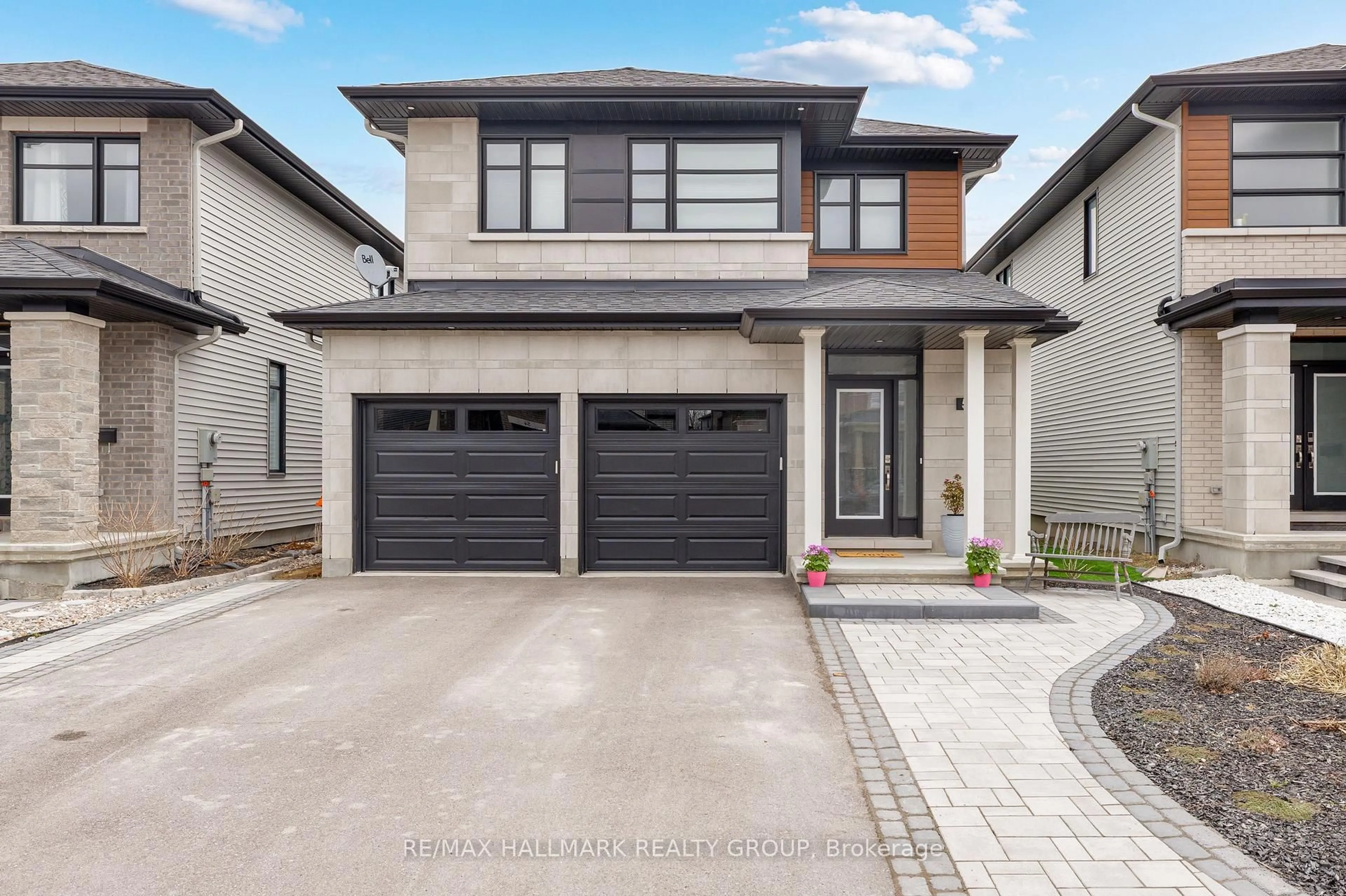 Home with brick exterior material, street for 55 Angel Hts, Stittsville Ontario K2S 2N4