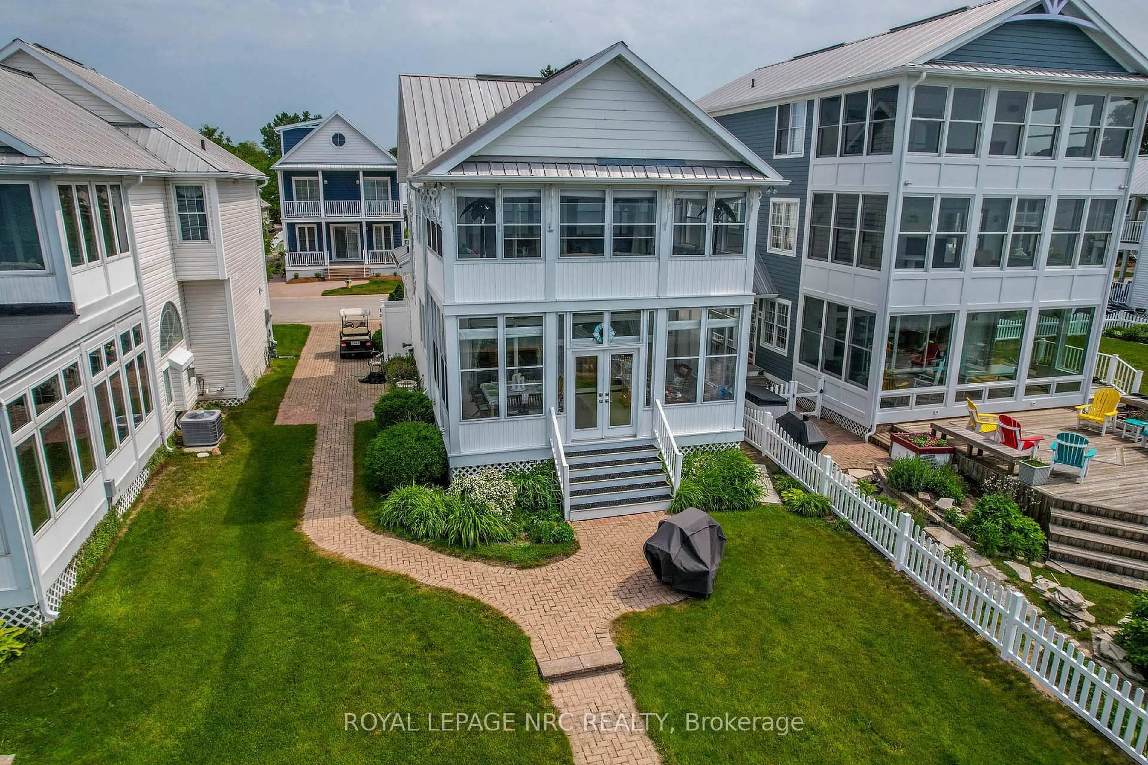 A pic from outside/outdoor area/front of a property/back of a property/a pic from drone, water/lake/river/ocean view for 23 Promenade Way, Fort Erie Ontario L0S 1B0