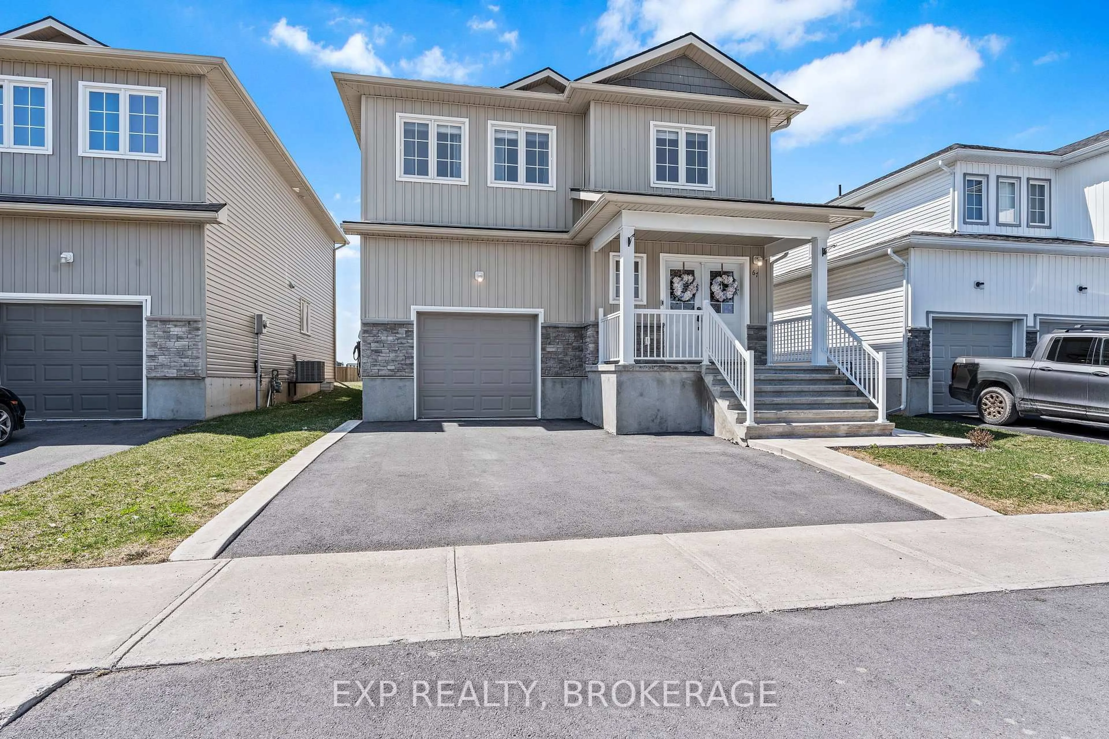 Home with vinyl exterior material, street for 67 BRENNAN Cres, Bissett Creek Ontario K0H 2H0