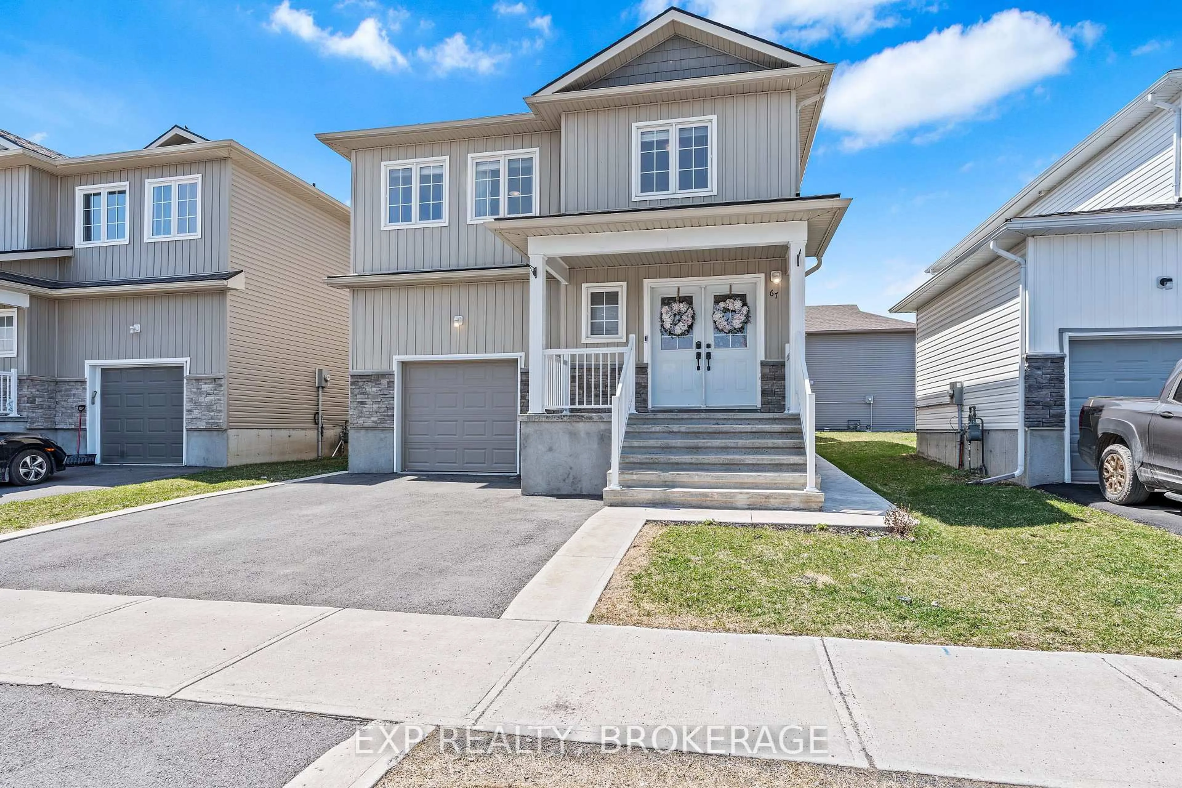 Home with vinyl exterior material, street for 67 BRENNAN Cres, Bissett Creek Ontario K0H 2H0