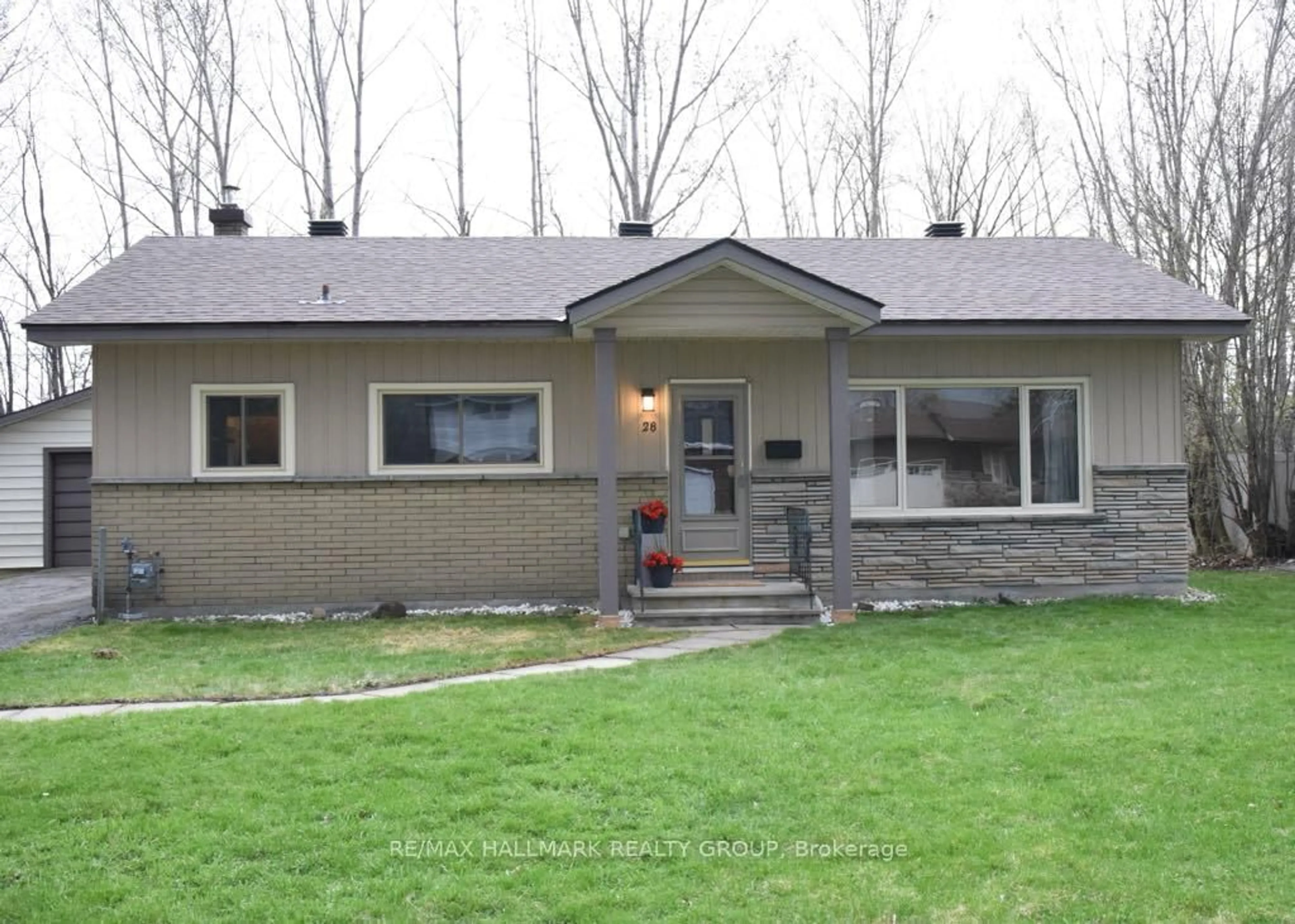 Home with vinyl exterior material, street for 28 Kirkstall Ave, Ottawa Ontario K2G 3M5
