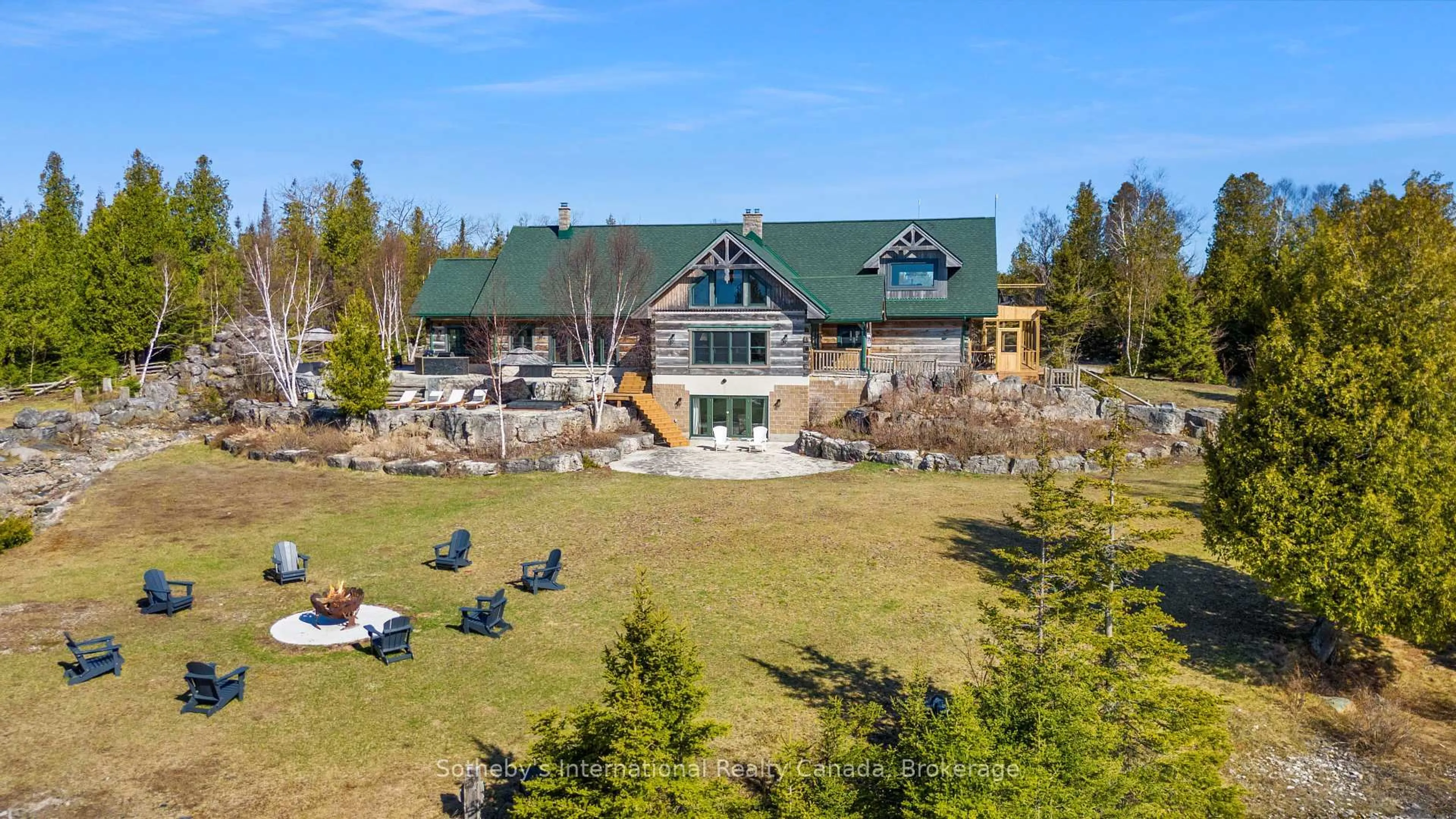 A pic from outside/outdoor area/front of a property/back of a property/a pic from drone, unknown for 191-221 Pennie Ave, Tehkummah Ontario P0P 2C0