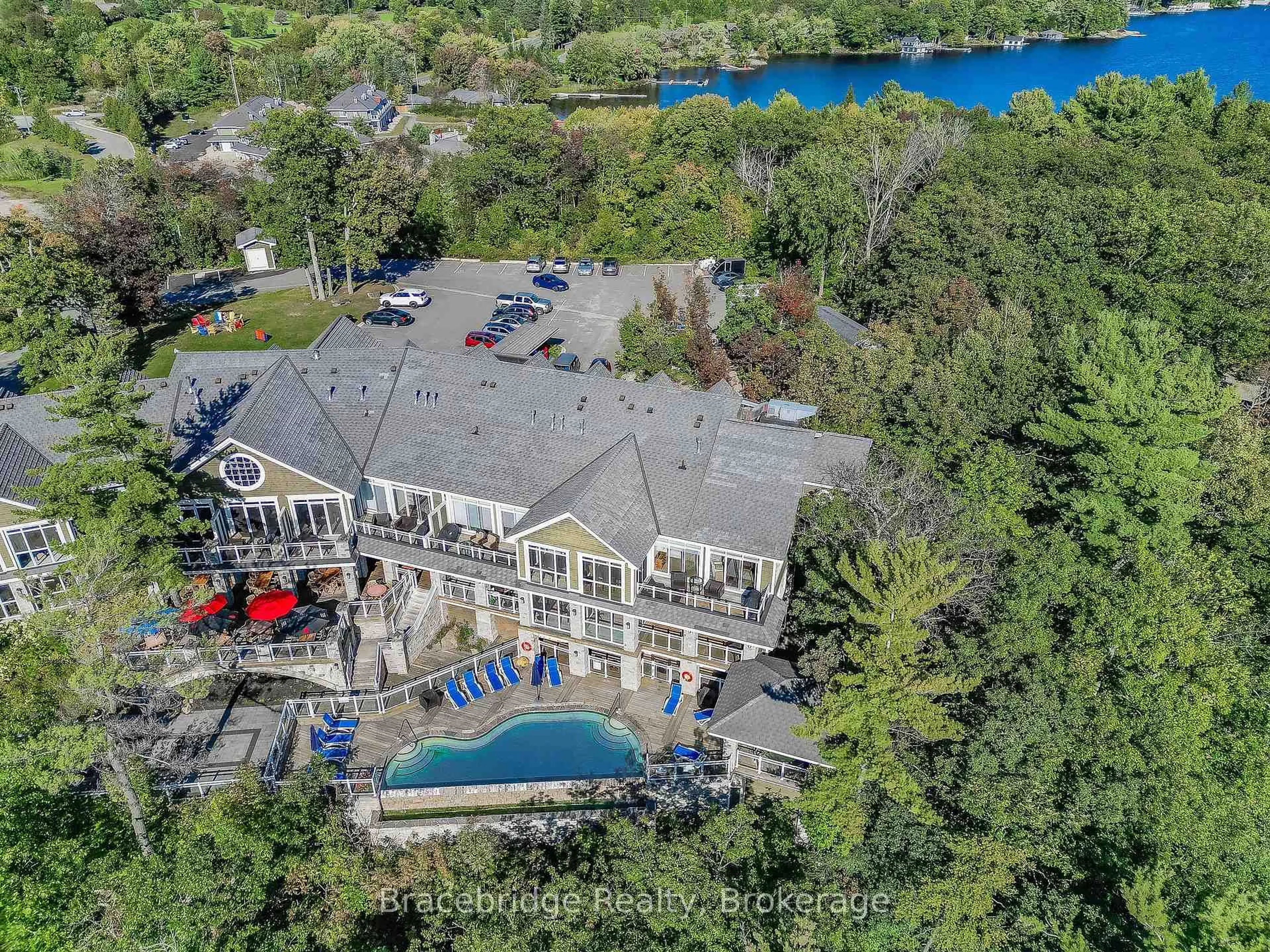 A pic from outside/outdoor area/front of a property/back of a property/a pic from drone, water/lake/river/ocean view for 1869 Muskoka 118 Highway #L215-C2, Muskoka Lakes Ontario P1L 1W8