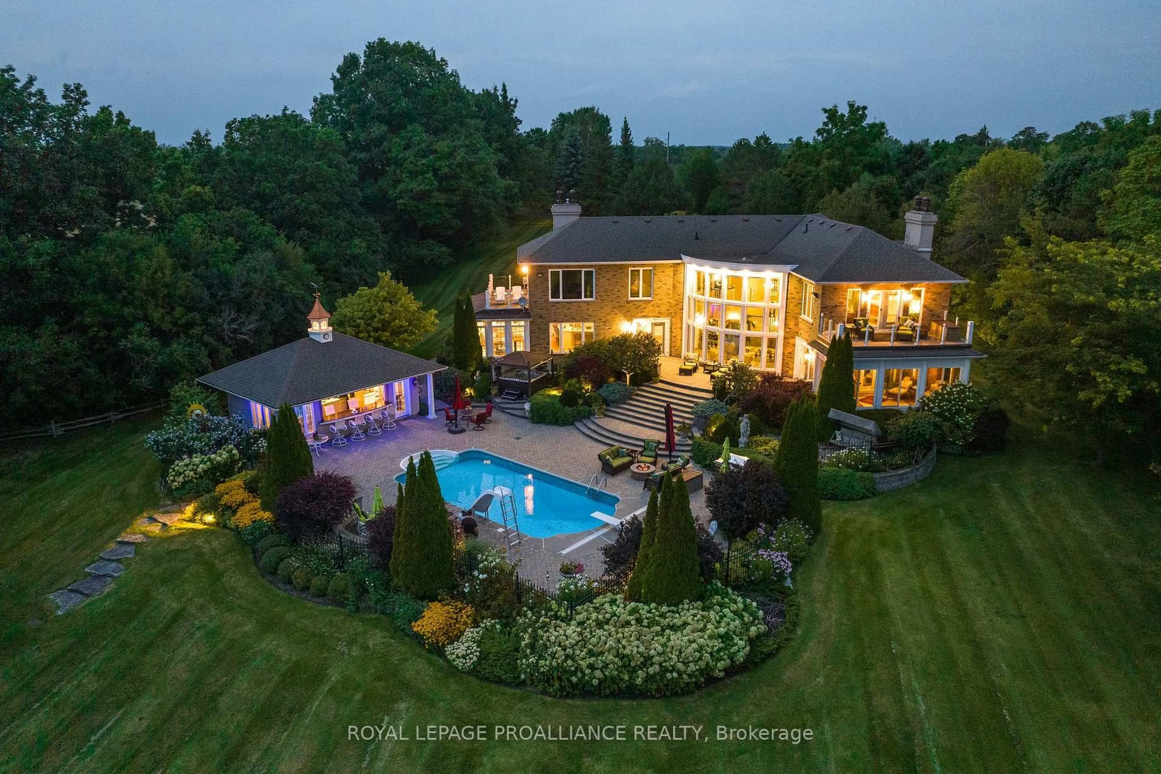 A pic from outside/outdoor area/front of a property/back of a property/a pic from drone, water/lake/river/ocean view for 1261 County Rd 20 Rd, Prince Edward County Ontario K0K 3L0