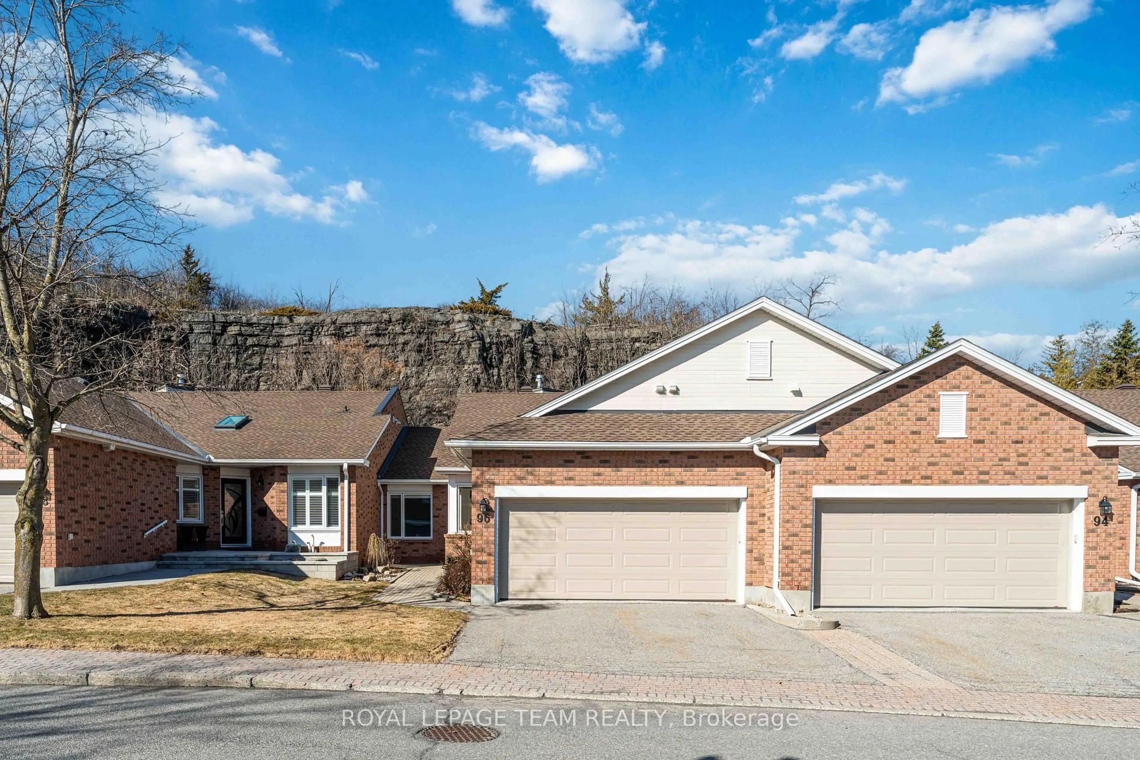 Home with brick exterior material, street for 96 Darlington Private, Ottawa Ontario K1V 0X8
