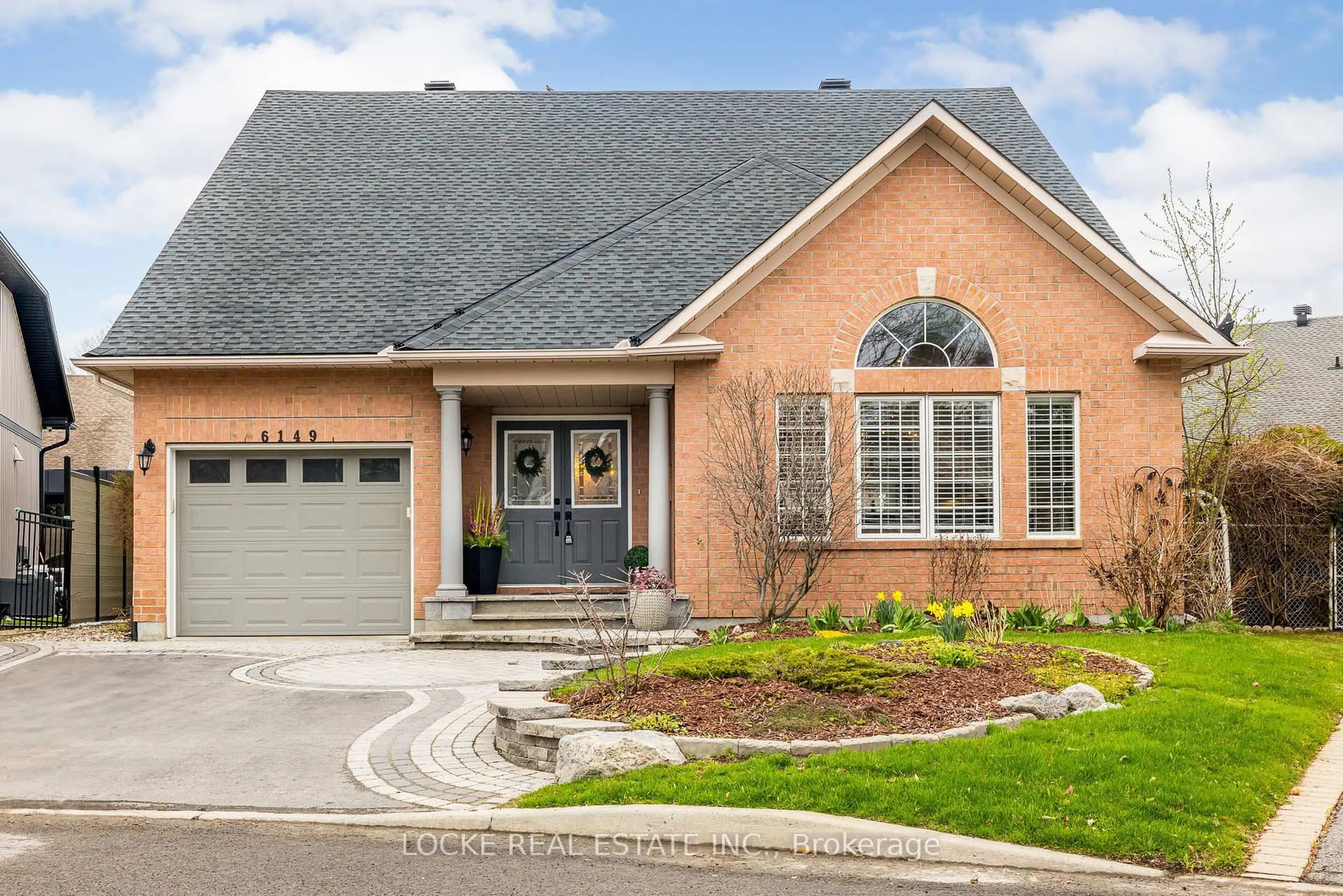Home with brick exterior material, street for 6149 Castle Pines Way, Ottawa Ontario K1W 1J1