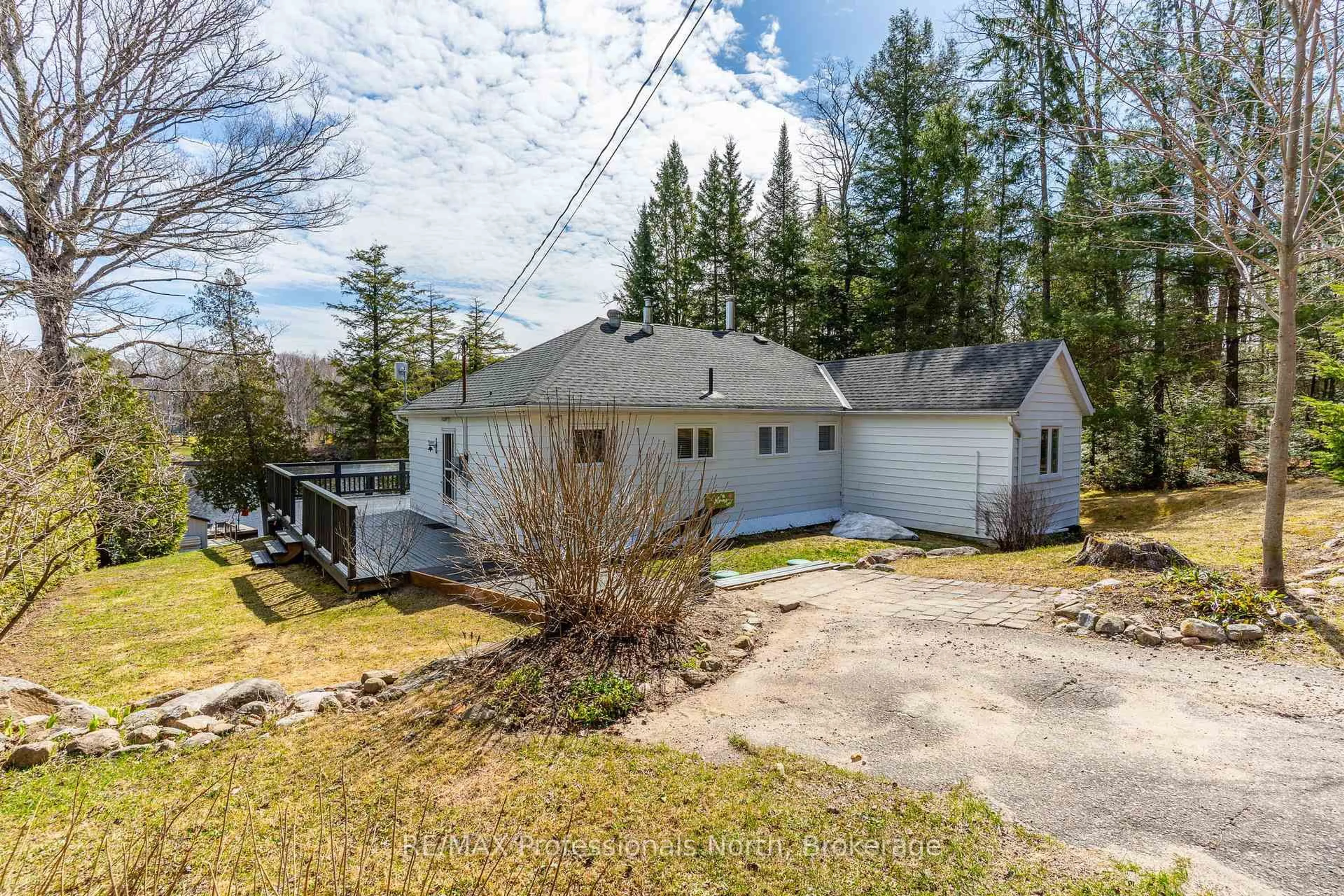 A pic from outside/outdoor area/front of a property/back of a property/a pic from drone, street for 1054 Grace River Rd, Highlands East Ontario K0L 1M0