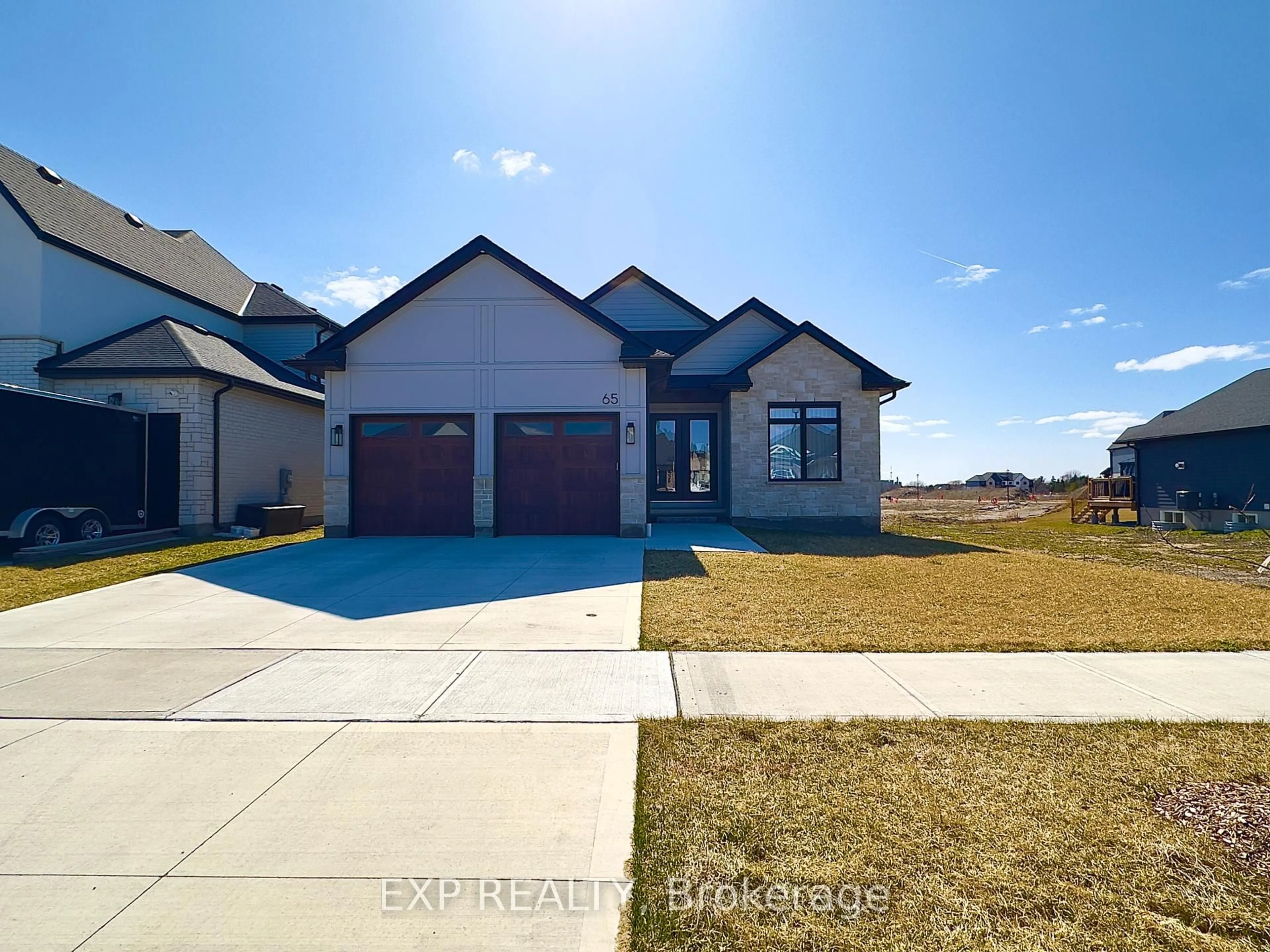 A pic from outside/outdoor area/front of a property/back of a property/a pic from drone, street for 65 Wayside Lane, Southwold Ontario N5P 3T2