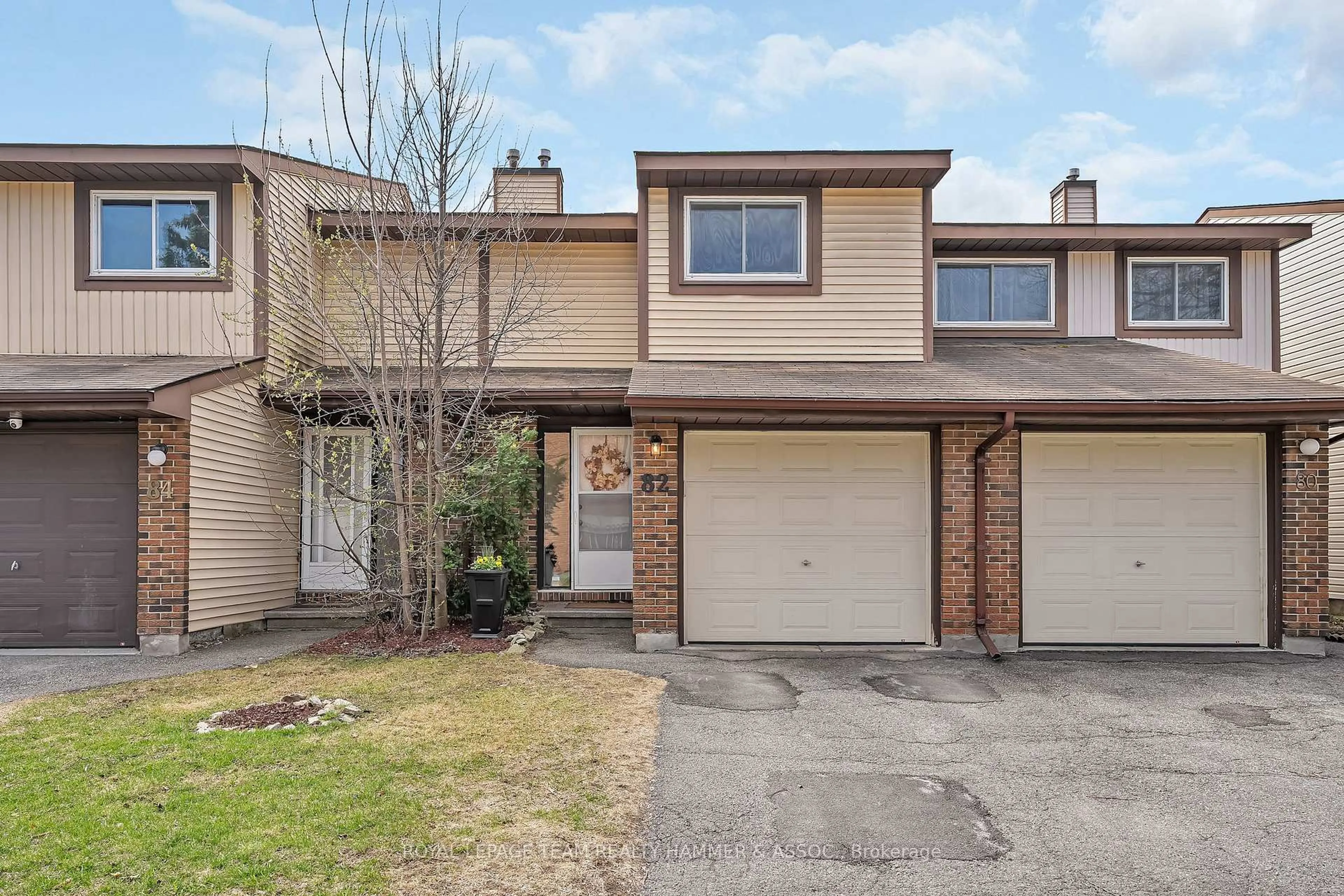 Home with vinyl exterior material, street for 82 Baneberry Cres, Ottawa Ontario K2L 2Y4