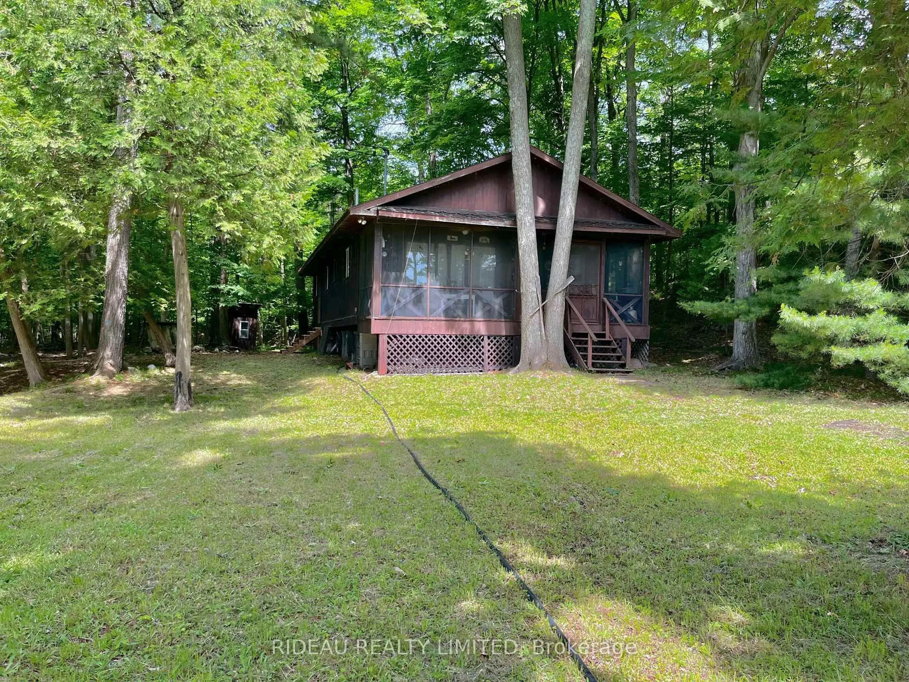 A pic from outside/outdoor area/front of a property/back of a property/a pic from drone, forest/trees view for 9 NEWBORO-MCCASKILL Island, Rideau Lakes Ontario K0G 1P0