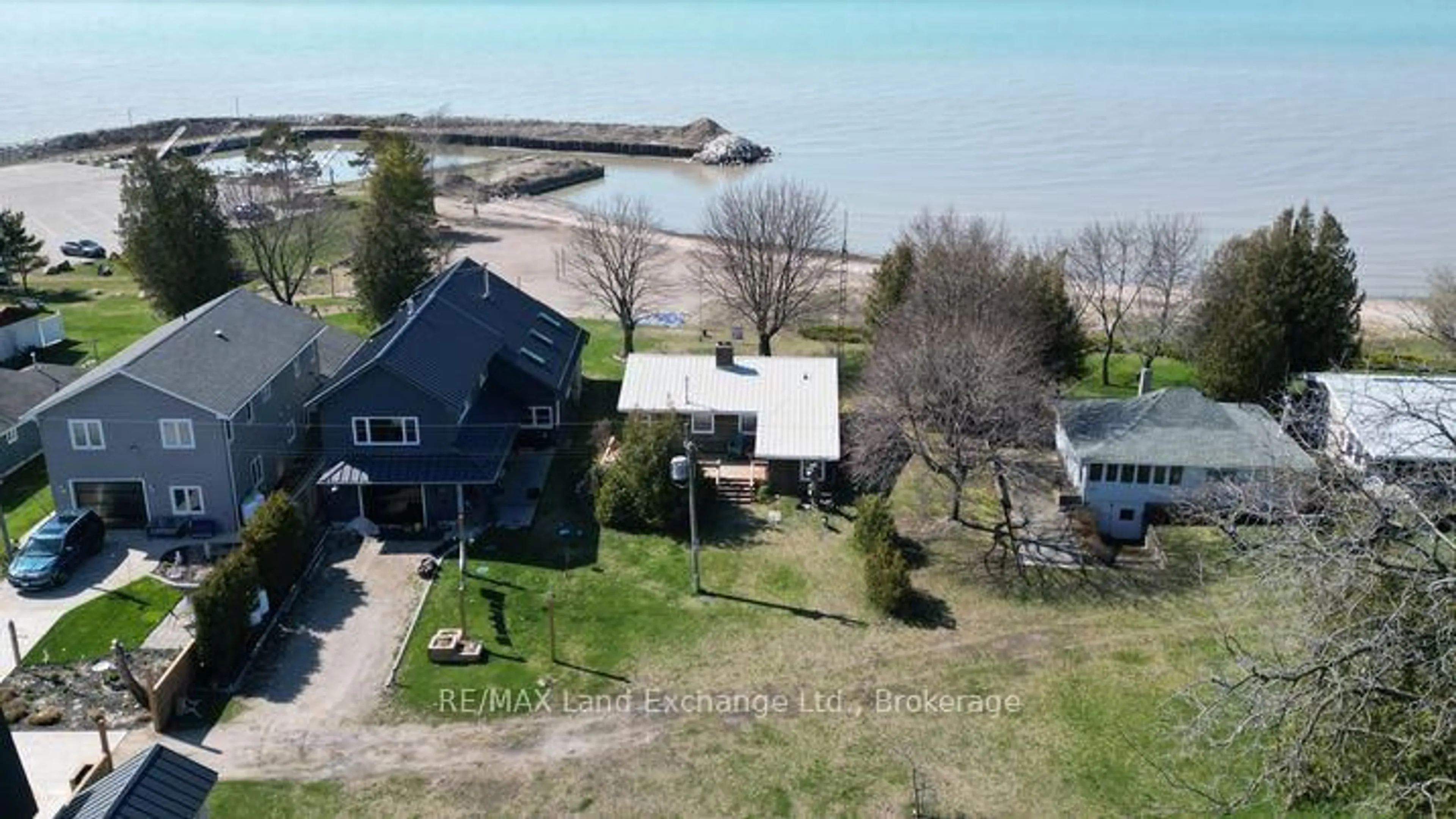 A pic from outside/outdoor area/front of a property/back of a property/a pic from drone, water/lake/river/ocean view for 805 Leonard Crt, Huron-Kinloss Ontario N2Z 2X3
