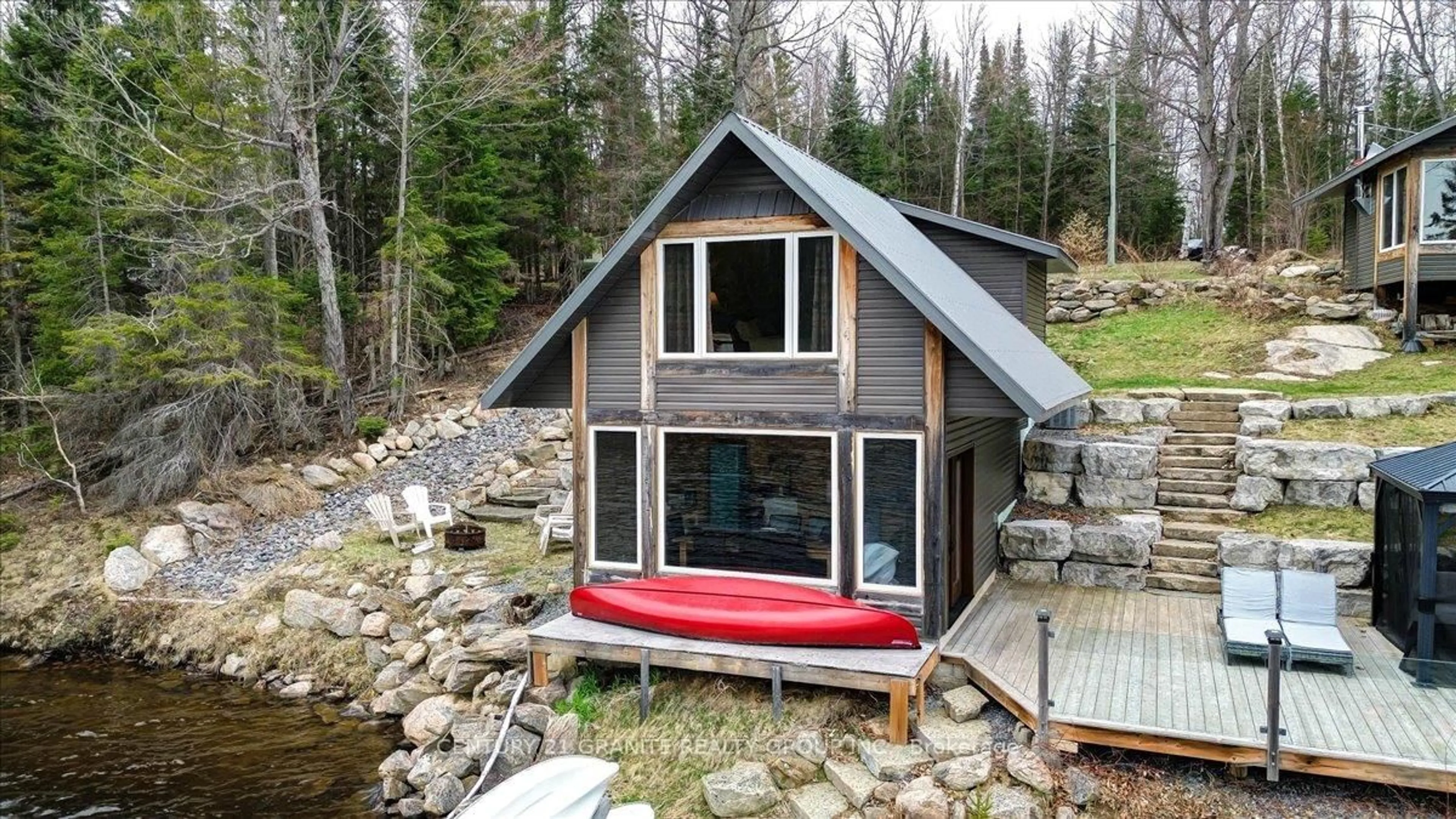A pic from outside/outdoor area/front of a property/back of a property/a pic from drone, water/lake/river/ocean view for 539B Dog Bay Rd, Maynooth Ontario K0L 2S0