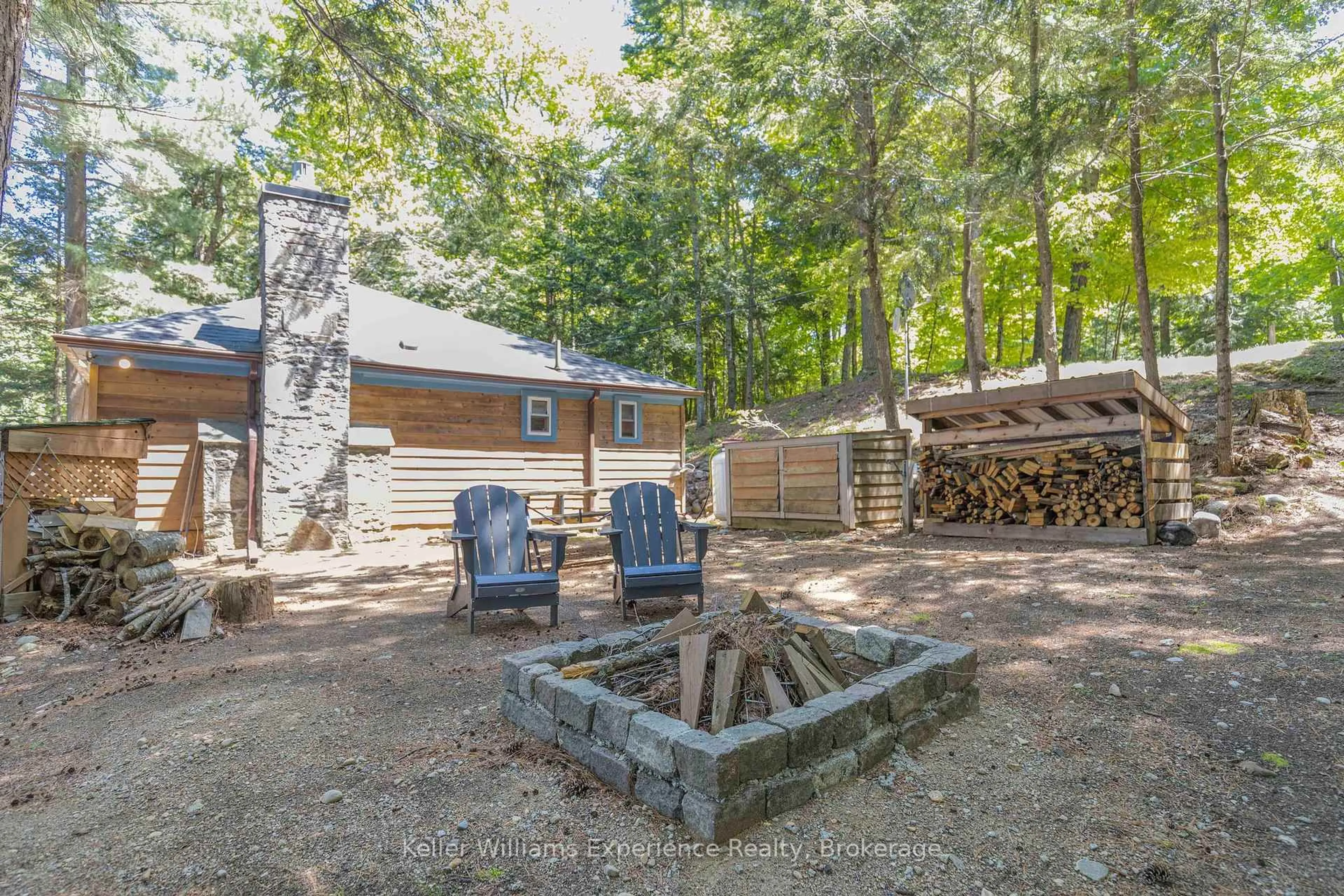 Patio, forest/trees view for 185 West Waseosa Lake Rd, Huntsville Ontario P1H 2N5