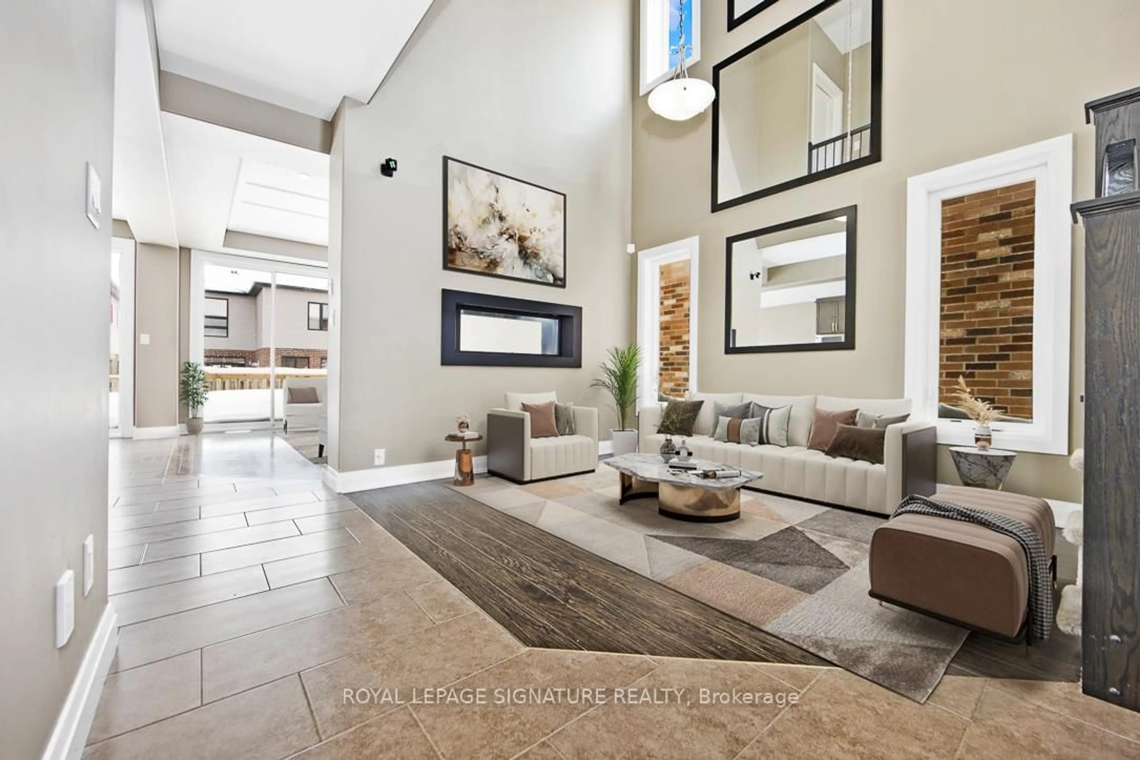 Living room with furniture, ceramic/tile floor for 593 Pinery Tr, Waterloo Ontario N2V 2Y3