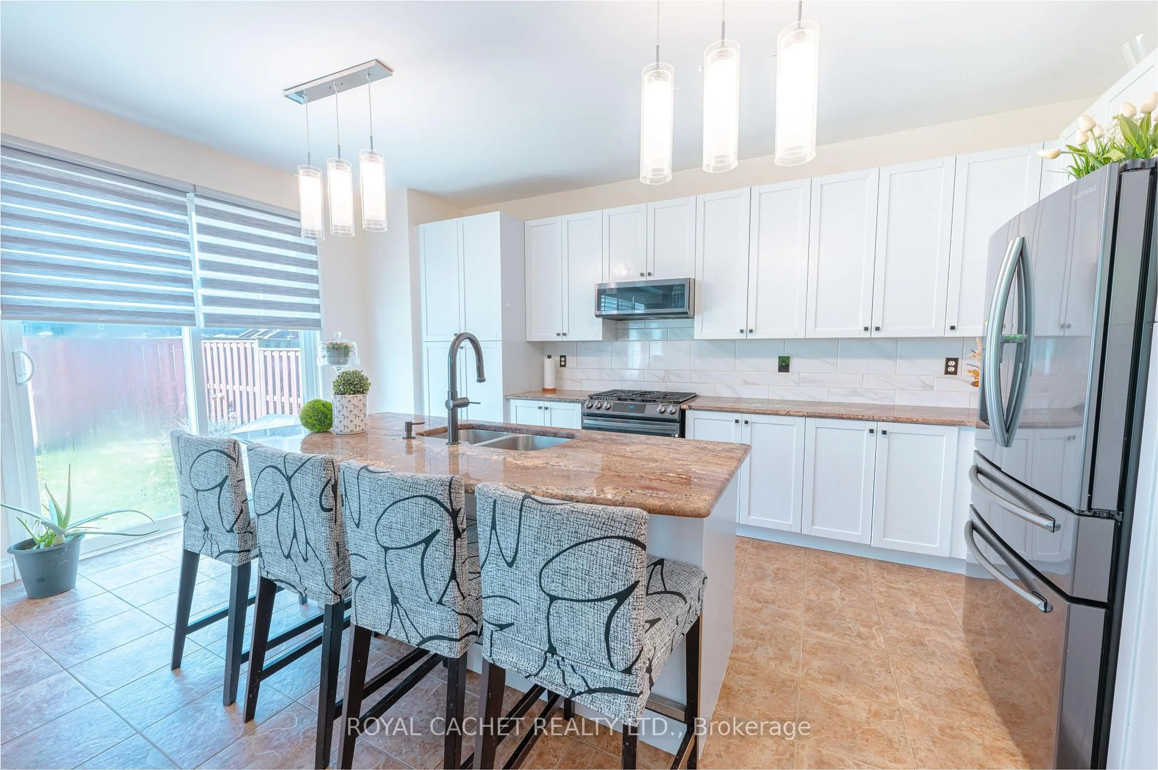 Open concept kitchen, ceramic/tile floor for 103 Fletcher Circ, Cambridge Ontario N3C 0B6