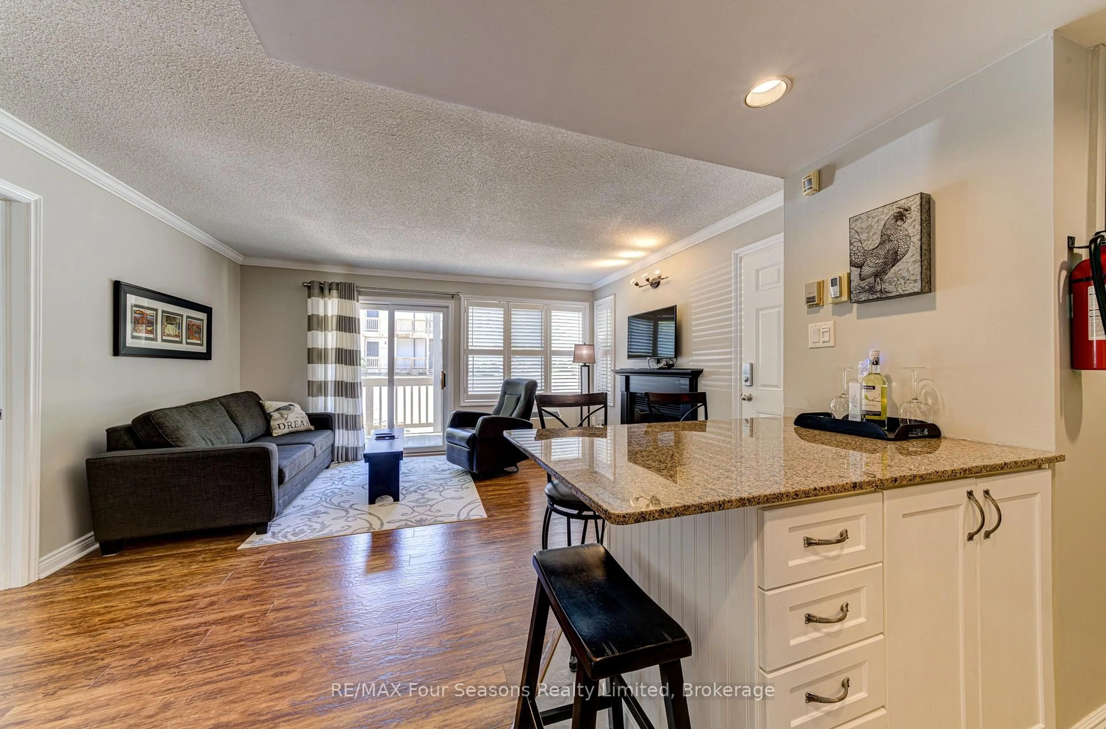 Open concept kitchen, wood/laminate floor for 796468 GREY ROAD 19 N/A #705, Blue Mountains Ontario L9Y 0N6