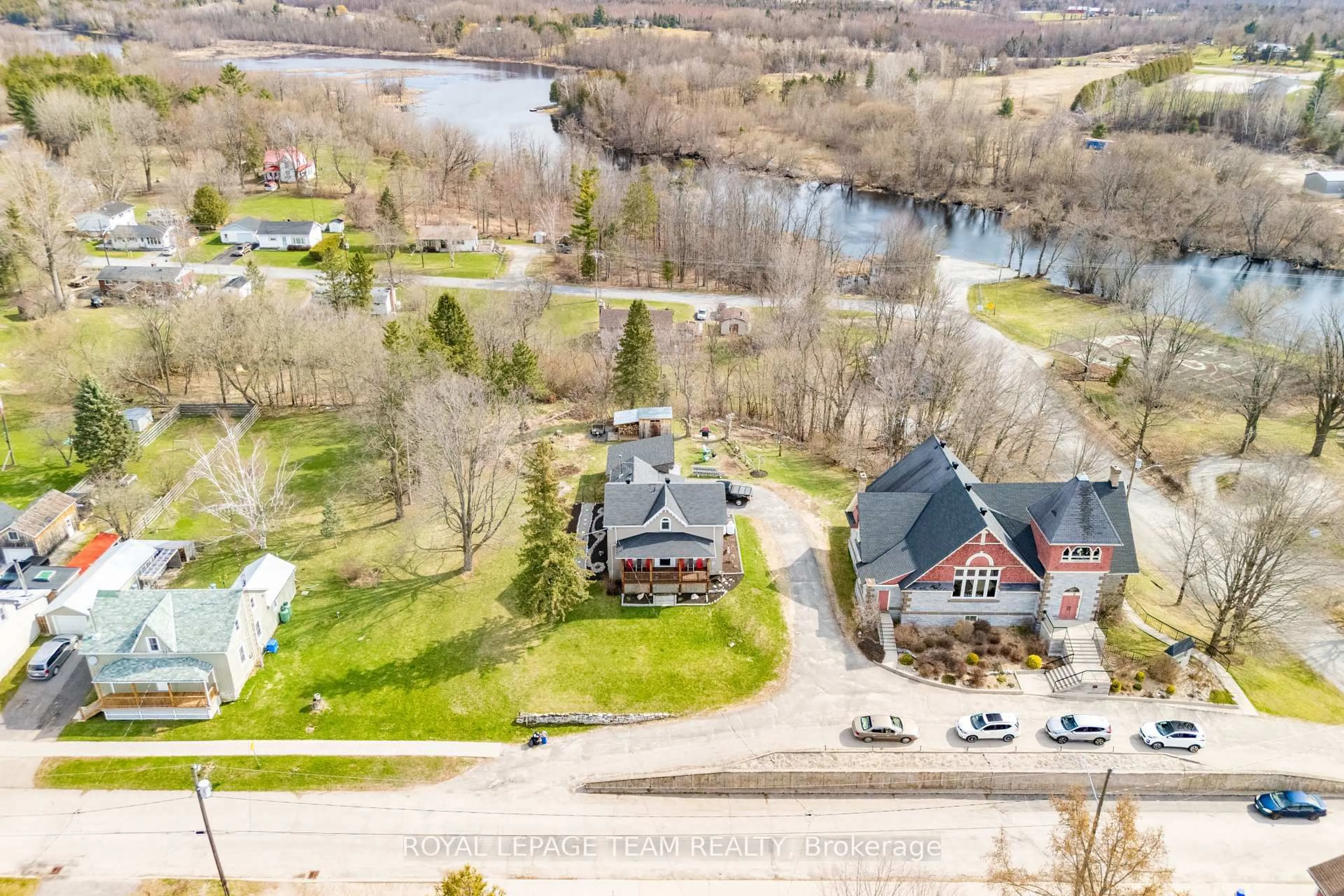 A pic from outside/outdoor area/front of a property/back of a property/a pic from drone, water/lake/river/ocean view for 81 York St, Lanark Ontario K0G 1K0