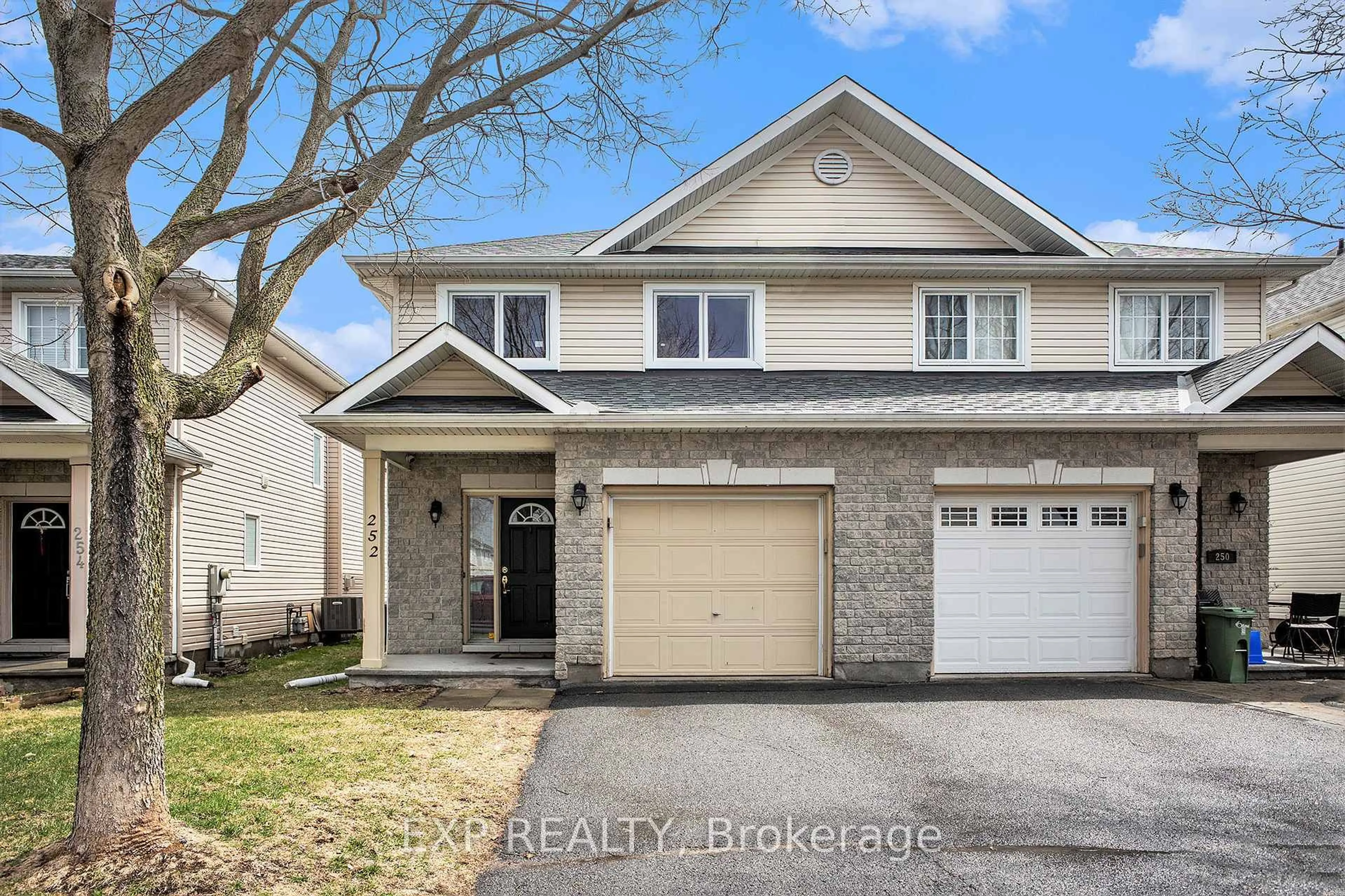 Home with brick exterior material, street for 252 Deerfox Dr, Ottawa Ontario K2J 4Z2